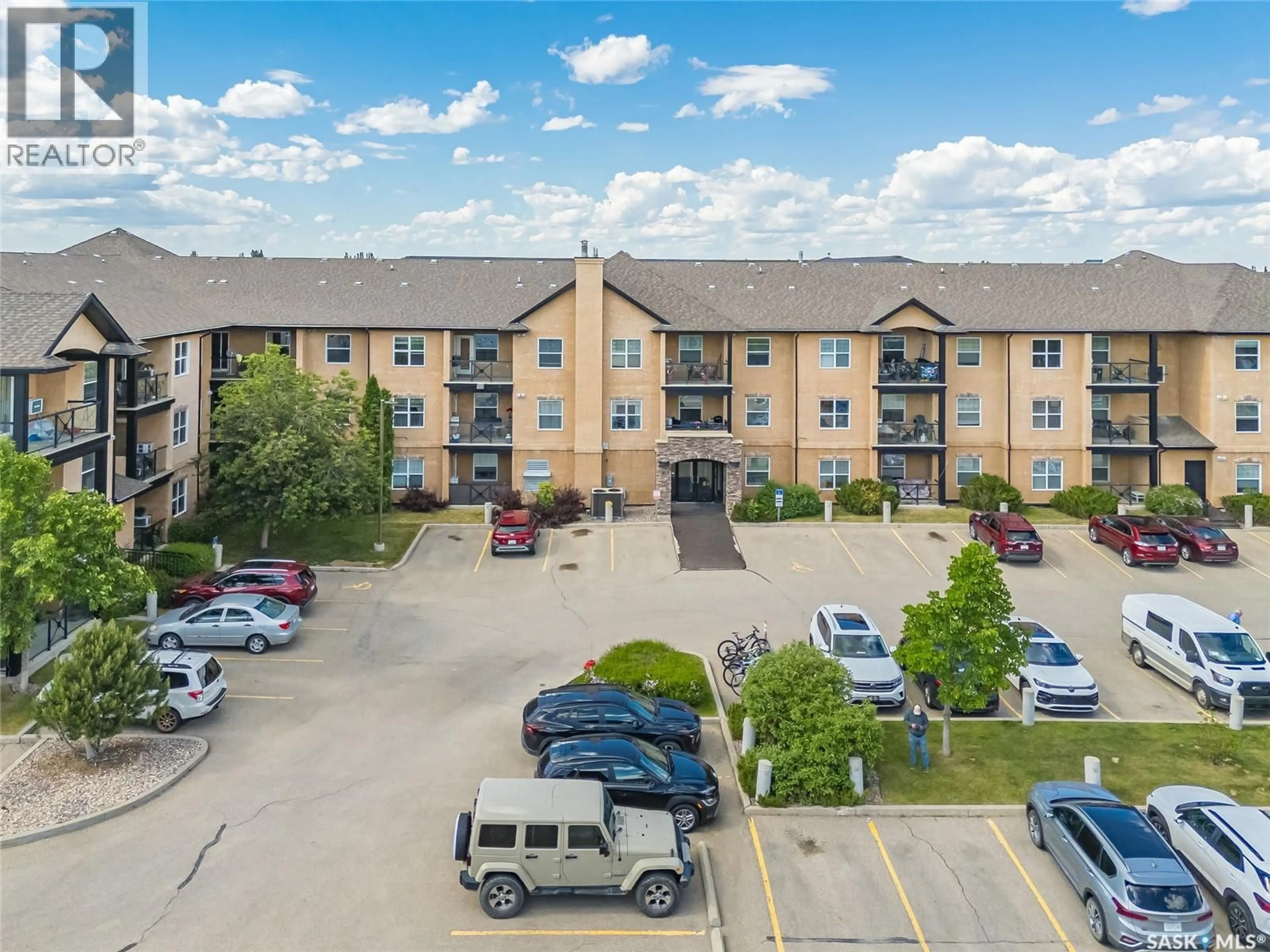 A pic from outside/outdoor area/front of a property/back of a property/a pic from drone, building for 116 326 HEROLD ROAD, Saskatoon Saskatchewan S7V0A2