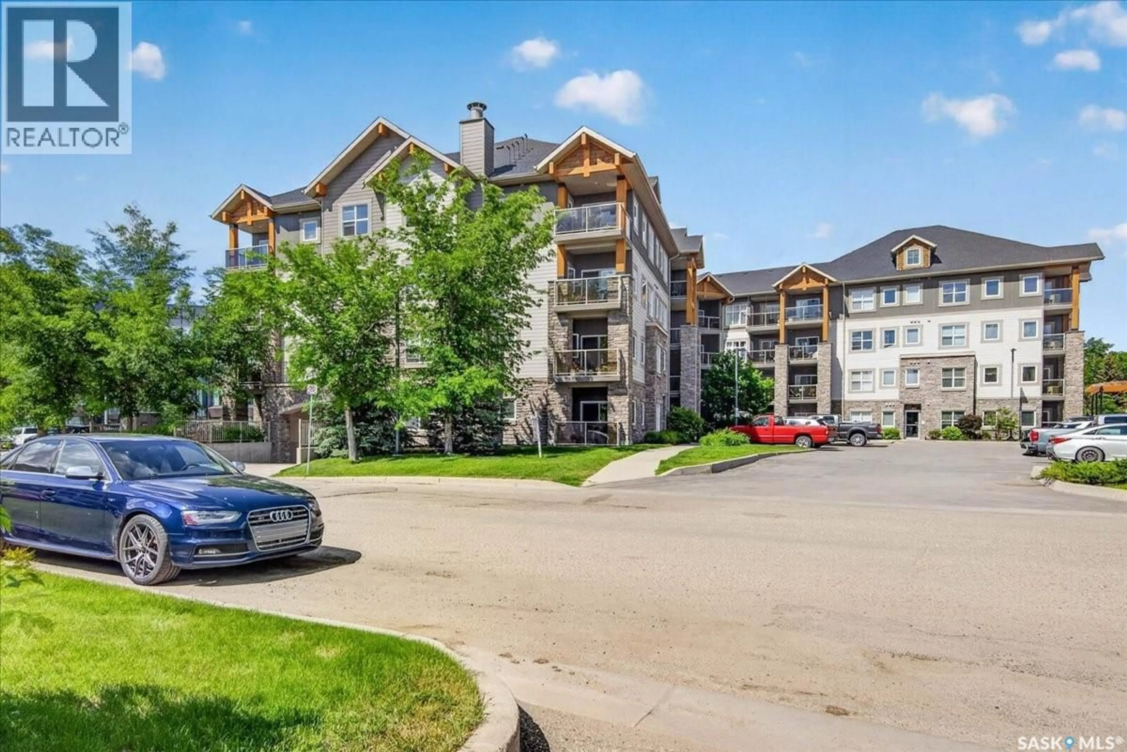 A pic from outside/outdoor area/front of a property/back of a property/a pic from drone, unknown for 211 - 1220 BLACKFOOT DRIVE, Regina Saskatchewan S4S6T2