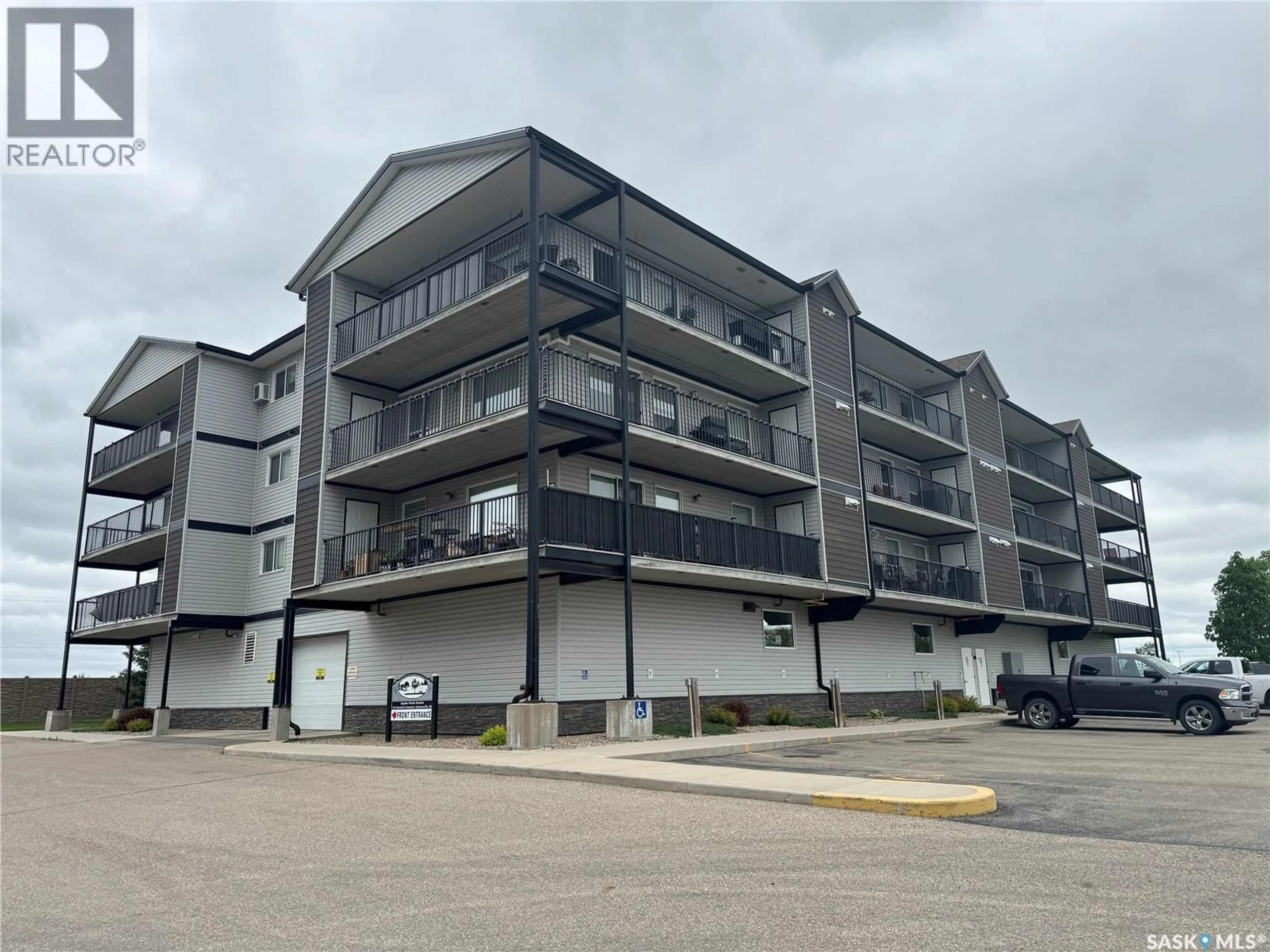 A pic from outside/outdoor area/front of a property/back of a property/a pic from drone, building for 201 135 BEAUDRY CRESCENT, Martensville Saskatchewan S0K2T1