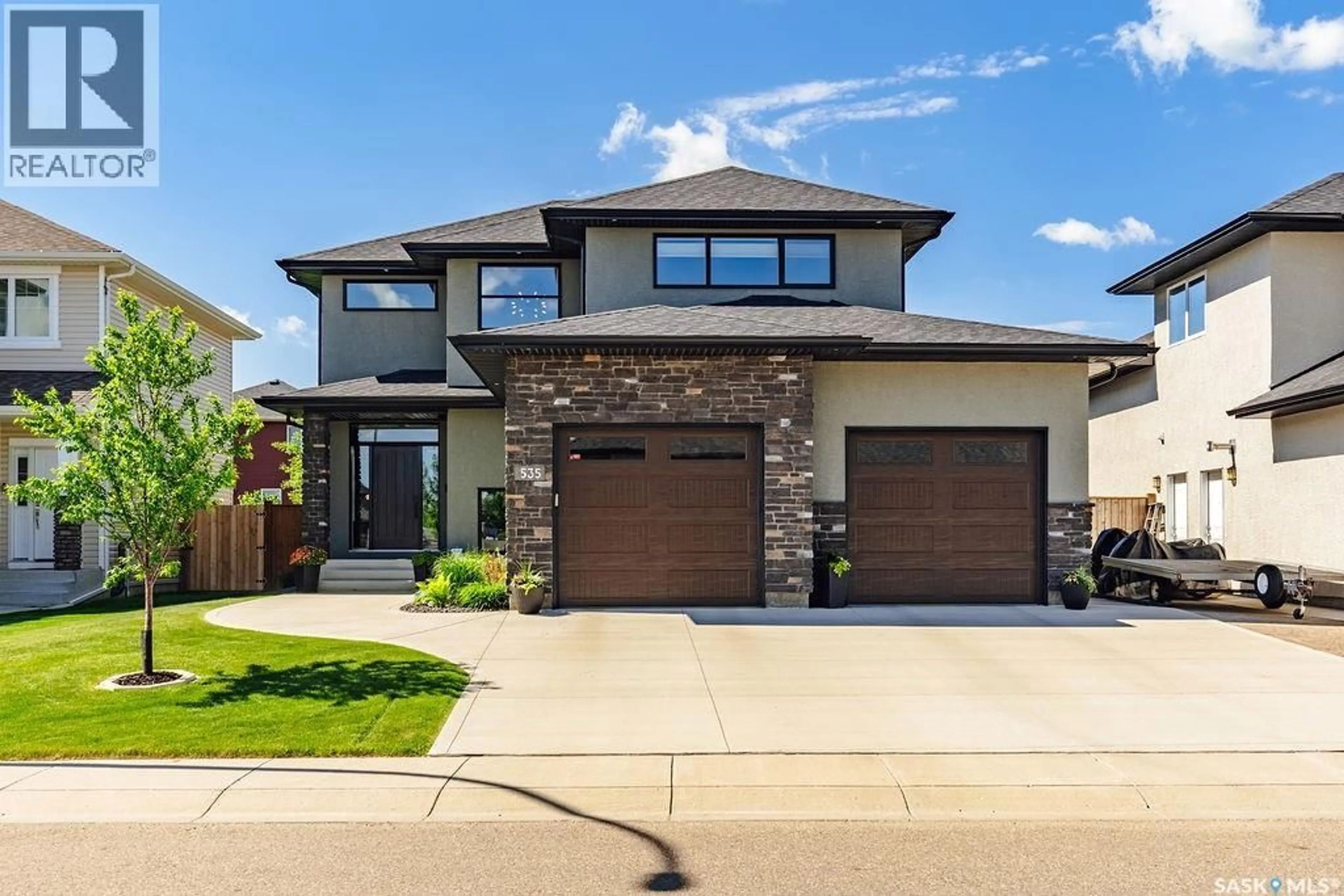 Home with brick exterior material, street for 535 PICHLER WAY, Saskatoon Saskatchewan S7V0H2