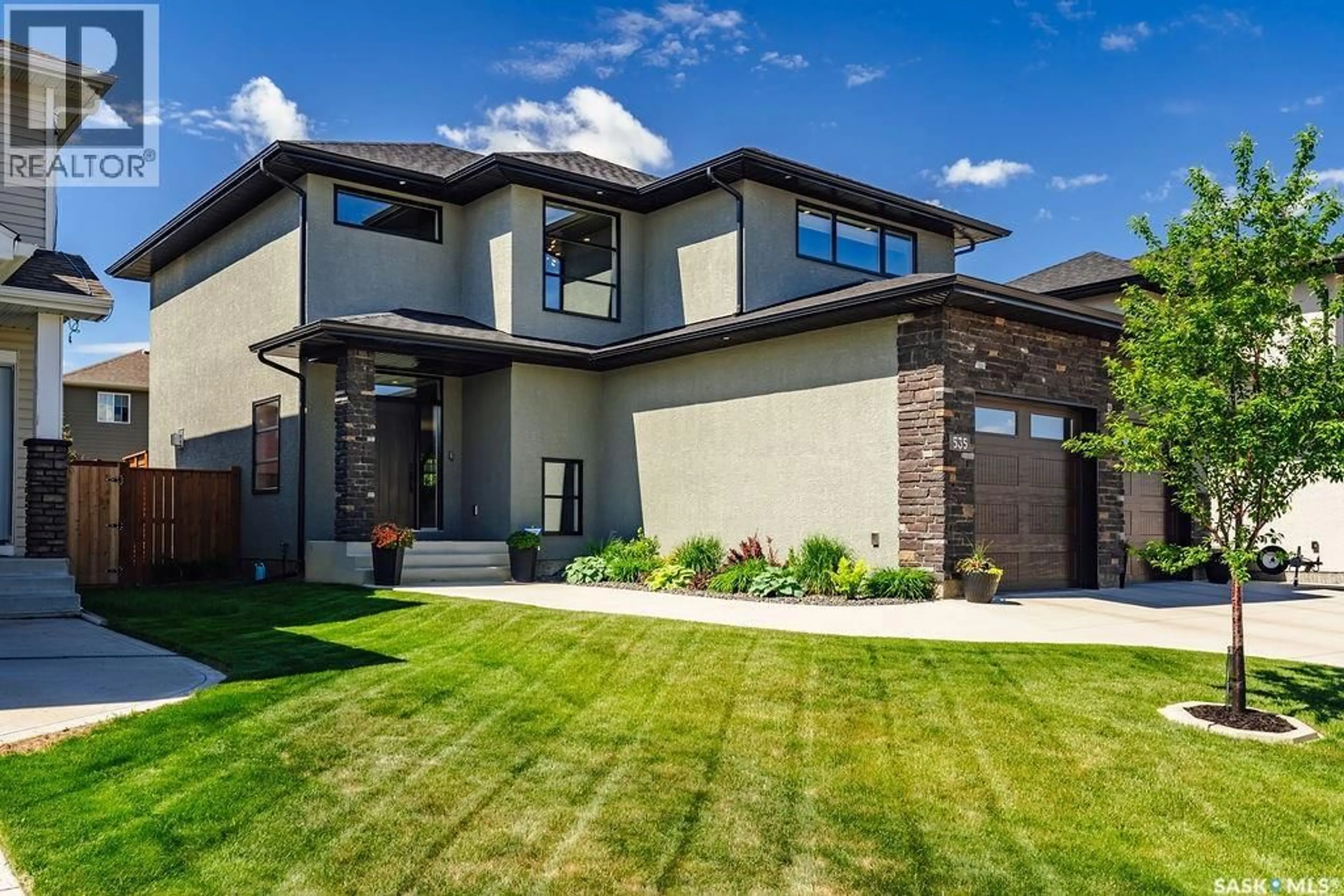 Home with brick exterior material, street for 535 PICHLER WAY, Saskatoon Saskatchewan S7V0H2