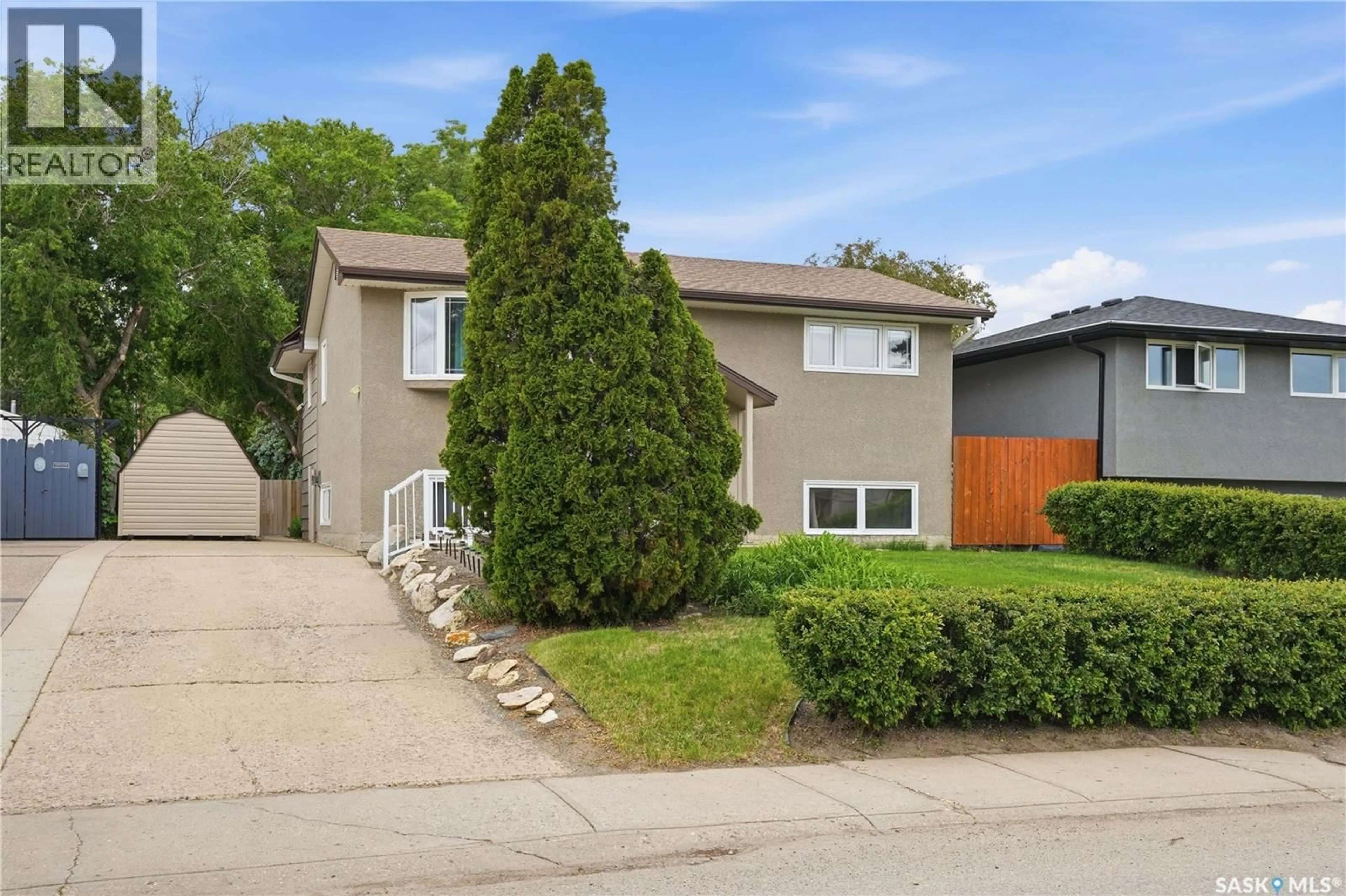 Home with vinyl exterior material, street for 1223 WARNER STREET, Moose Jaw Saskatchewan S6H6G9
