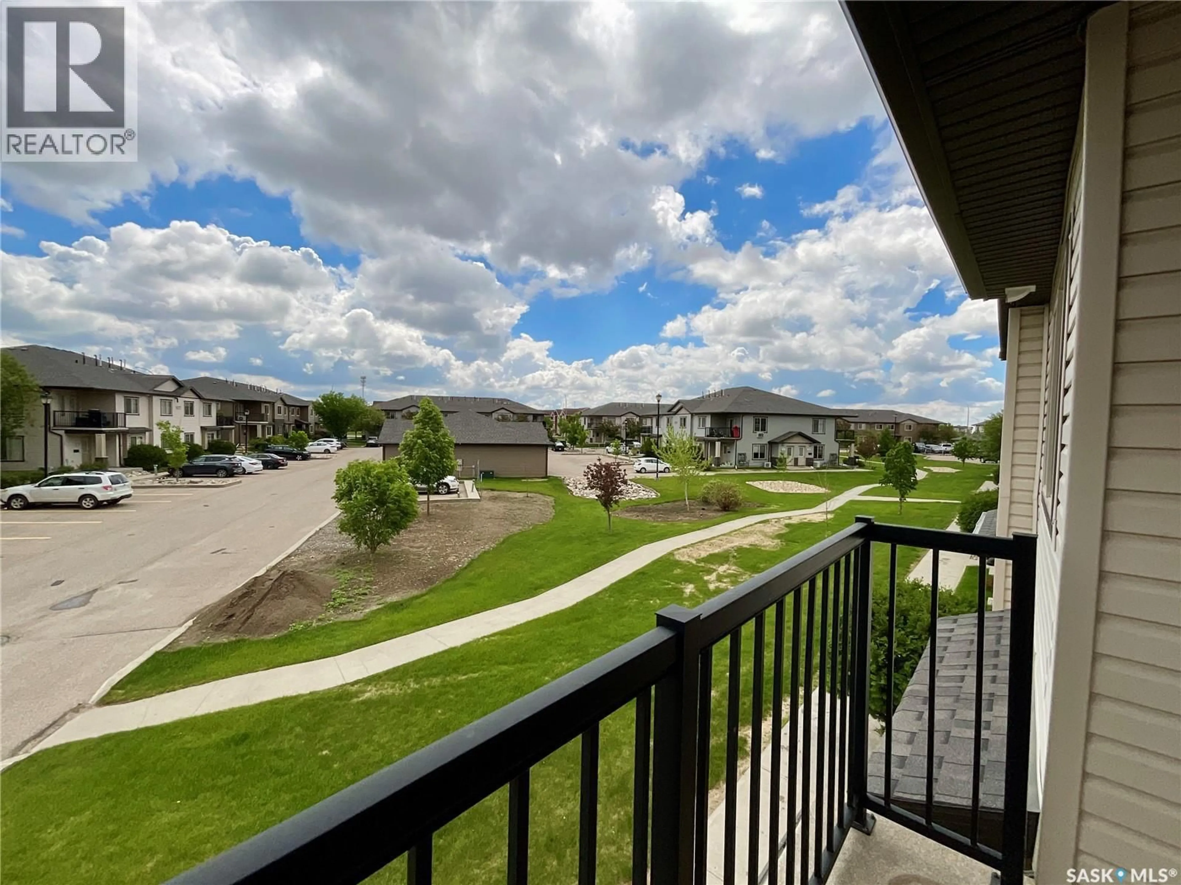 A pic from outside/outdoor area/front of a property/back of a property/a pic from drone, unknown for 108 - 5051 JAMES HILL ROAD, Regina Saskatchewan S4W0B9
