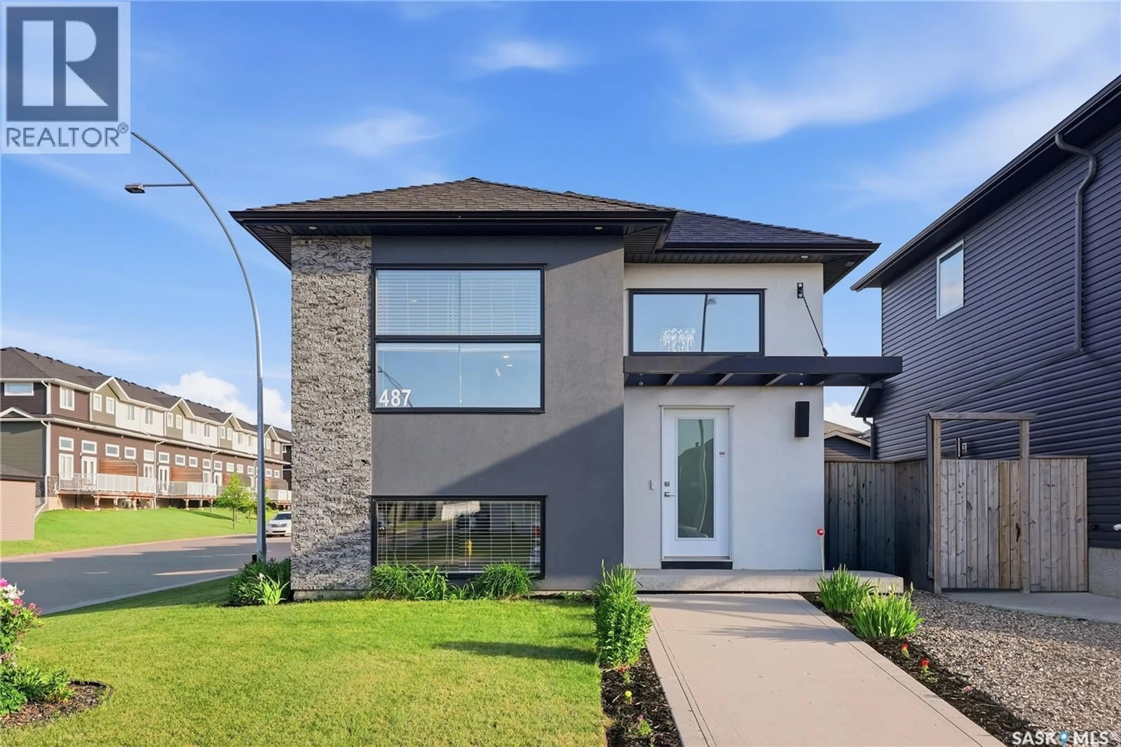 Home with brick exterior material, street for 487 KLOPPENBURG STREET, Saskatoon Saskatchewan S7W0N8