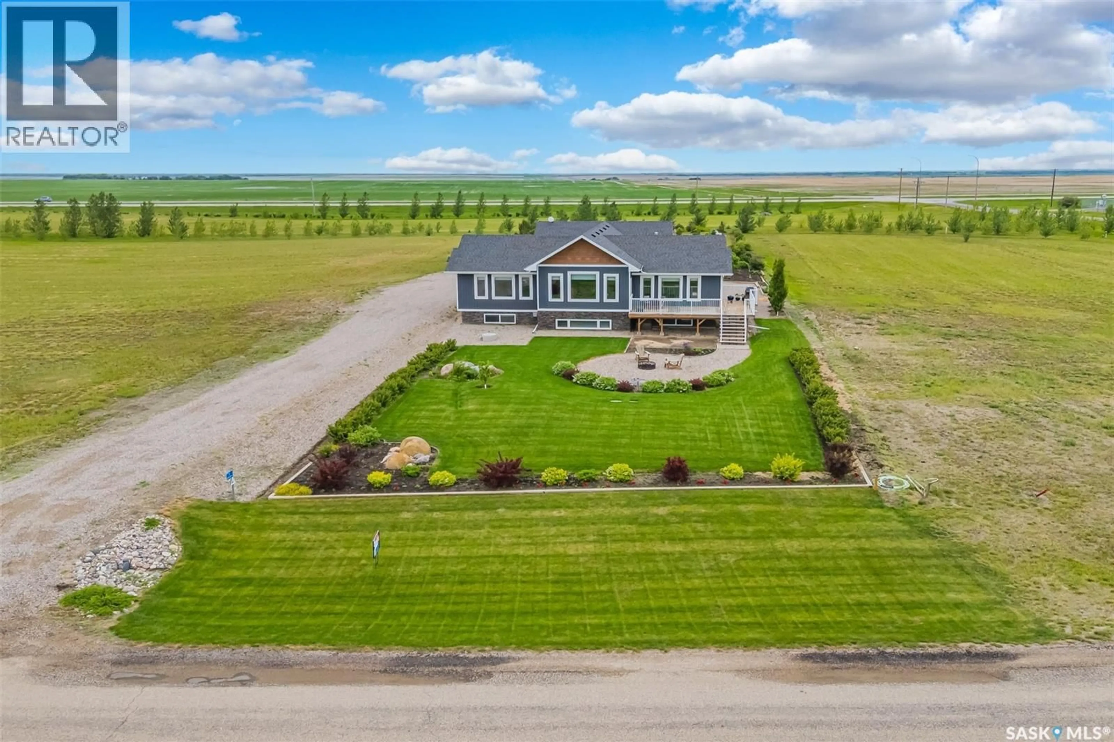 A pic from outside/outdoor area/front of a property/back of a property/a pic from drone, building for 3 SUNRISE DRIVE, Dundurn Rm No. 314 Saskatchewan S7C0A6