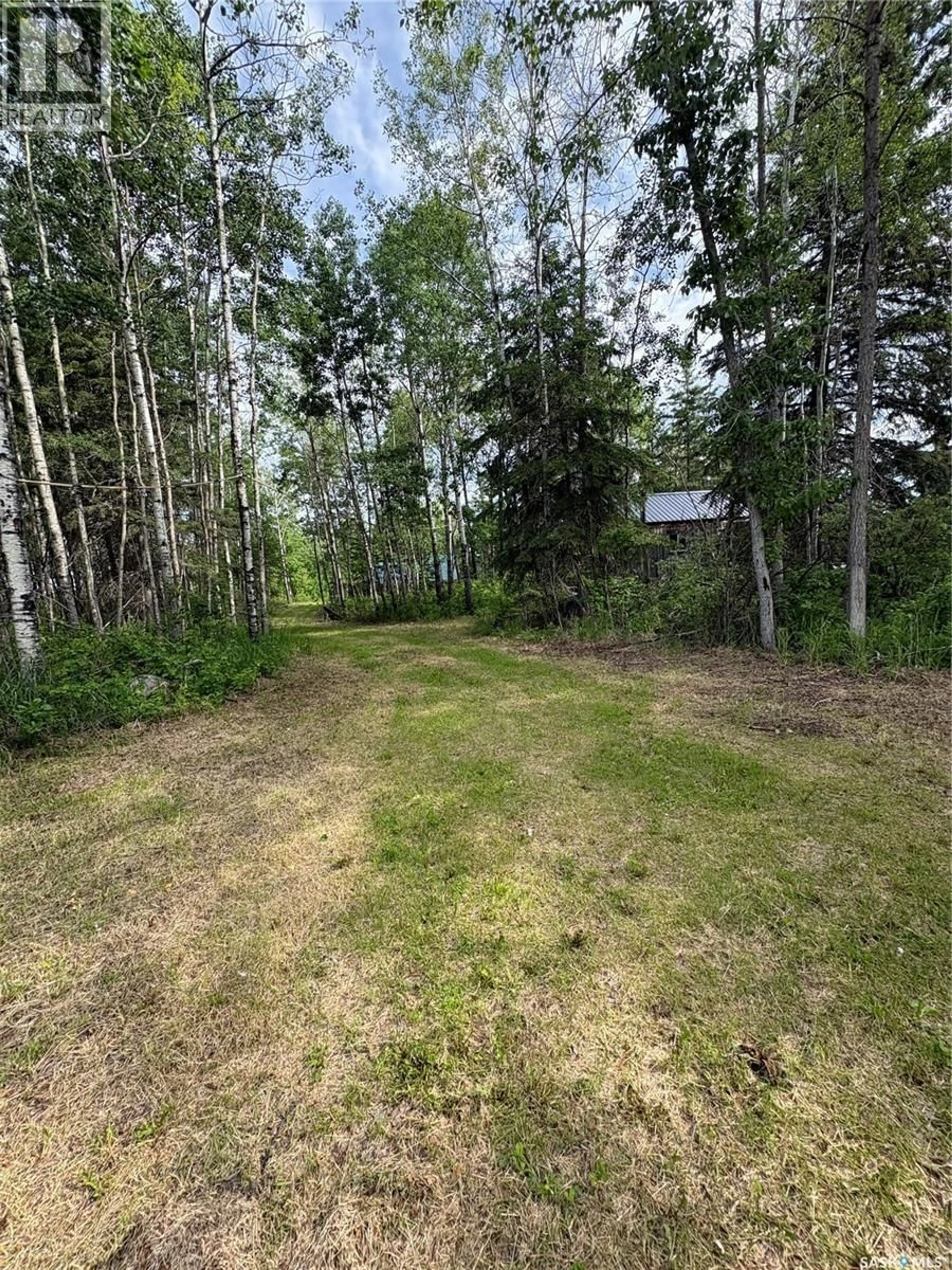 A pic from outside/outdoor area/front of a property/back of a property/a pic from drone, forest/trees view for SCHUTTE LAKE ACREAGE, Hazel Dell Rm No. 335 Saskatchewan S0A0W0