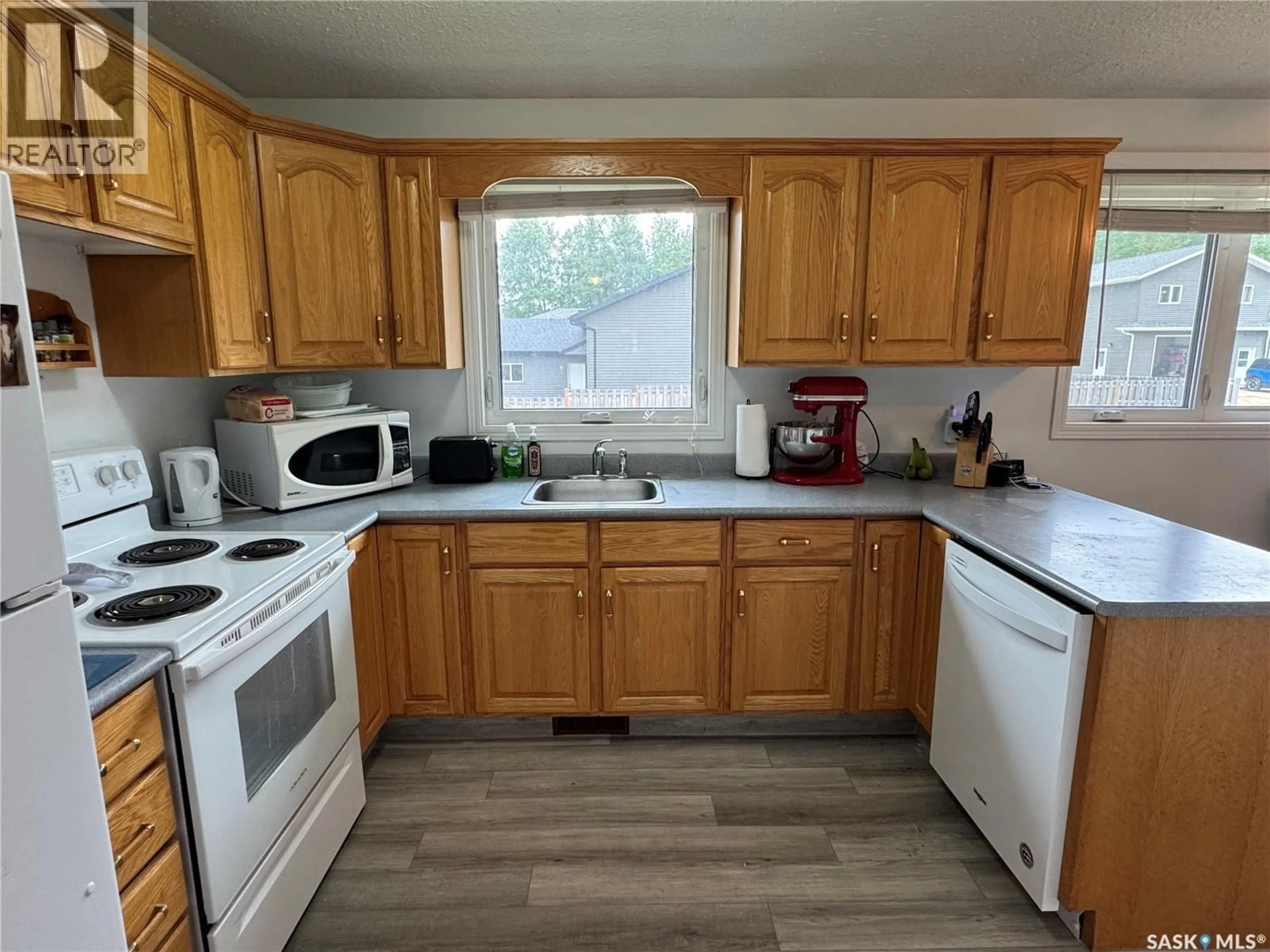 Standard kitchen, wood/laminate floor for 1504 STUDER STREET, La Ronge Saskatchewan S0J1L0