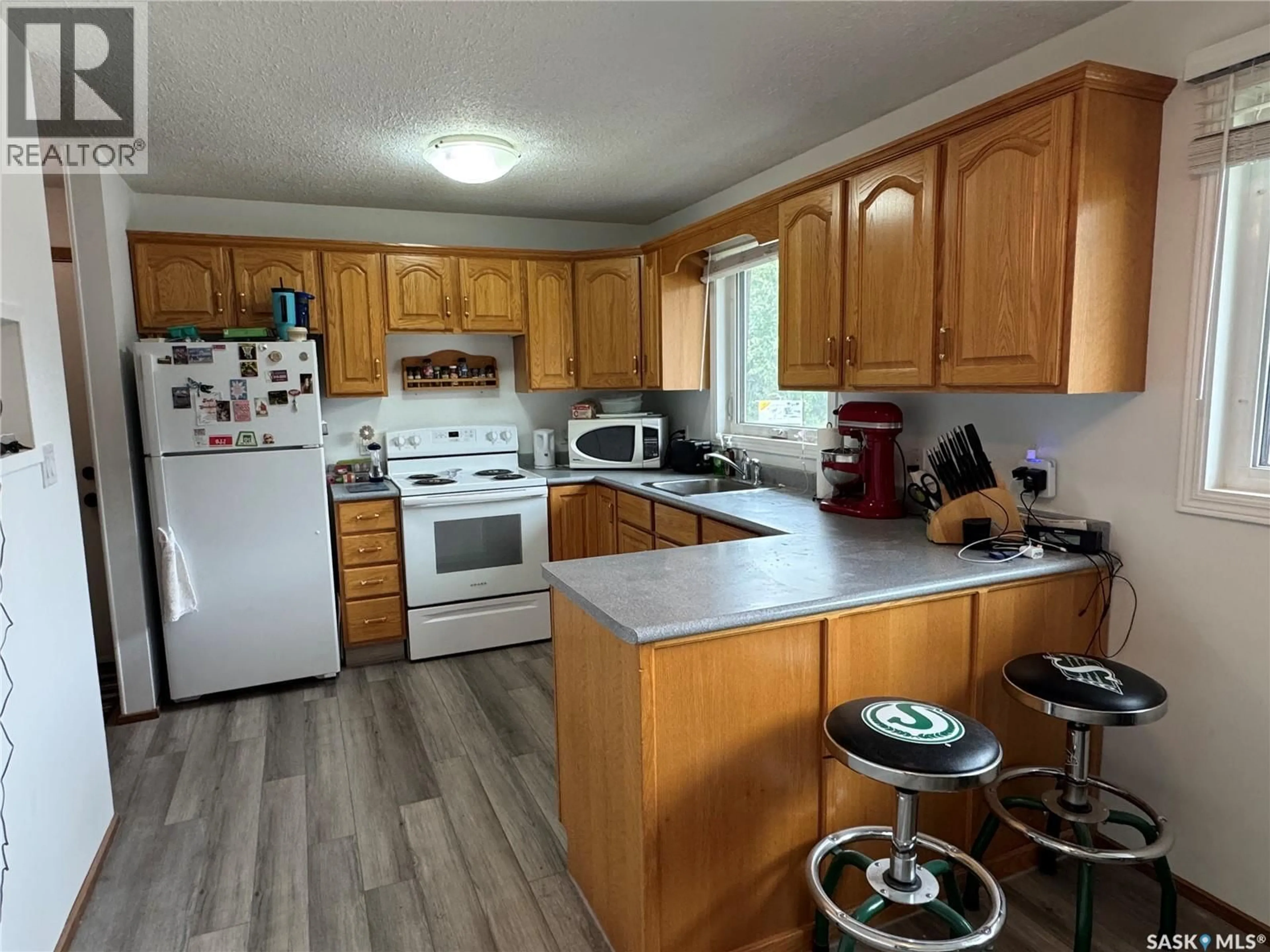 Standard kitchen, wood/laminate floor for 1504 STUDER STREET, La Ronge Saskatchewan S0J1L0