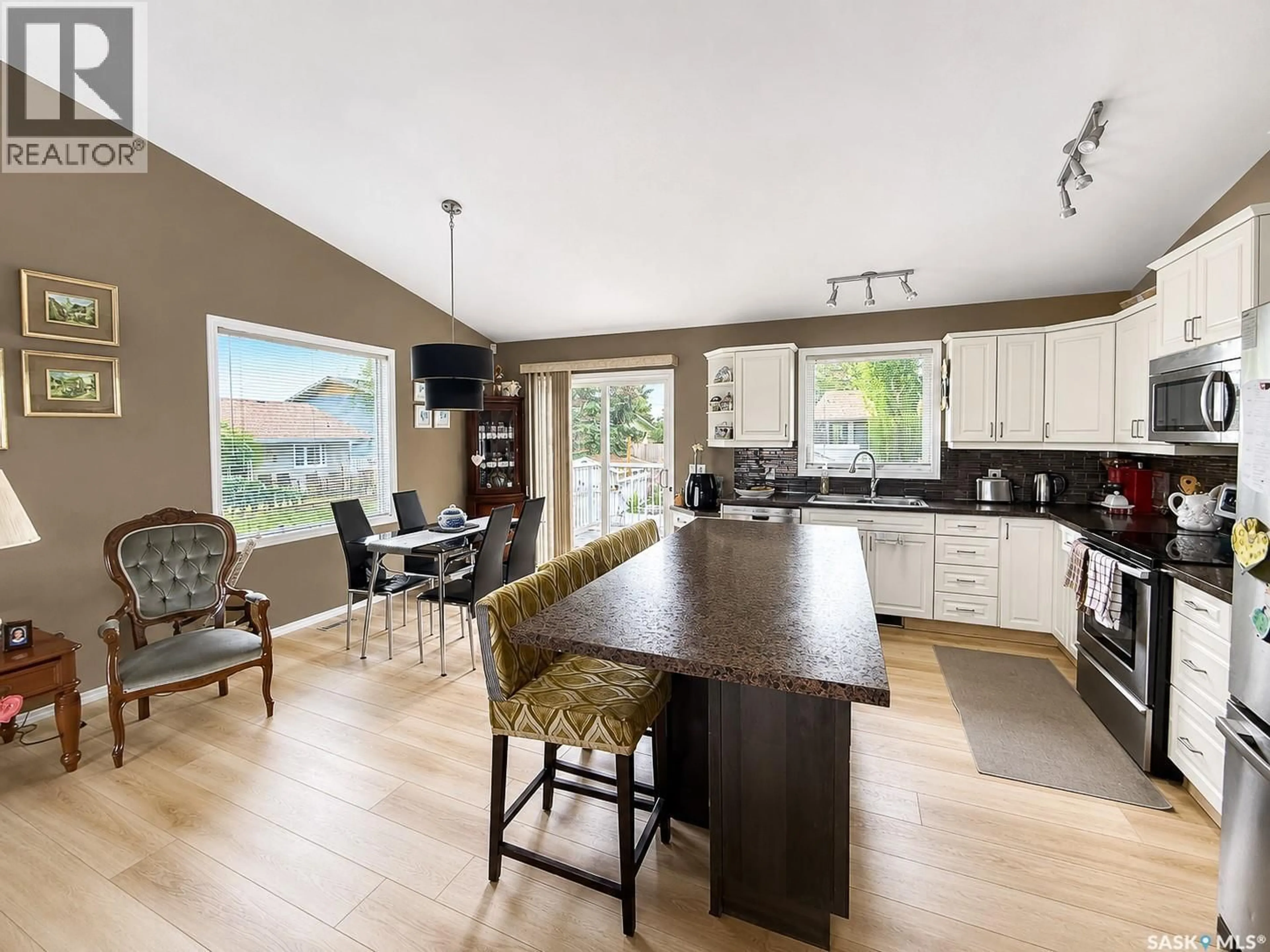 Open concept kitchen, wood/laminate floor for 192 JANET DRIVE, Battleford Saskatchewan S0M1X0