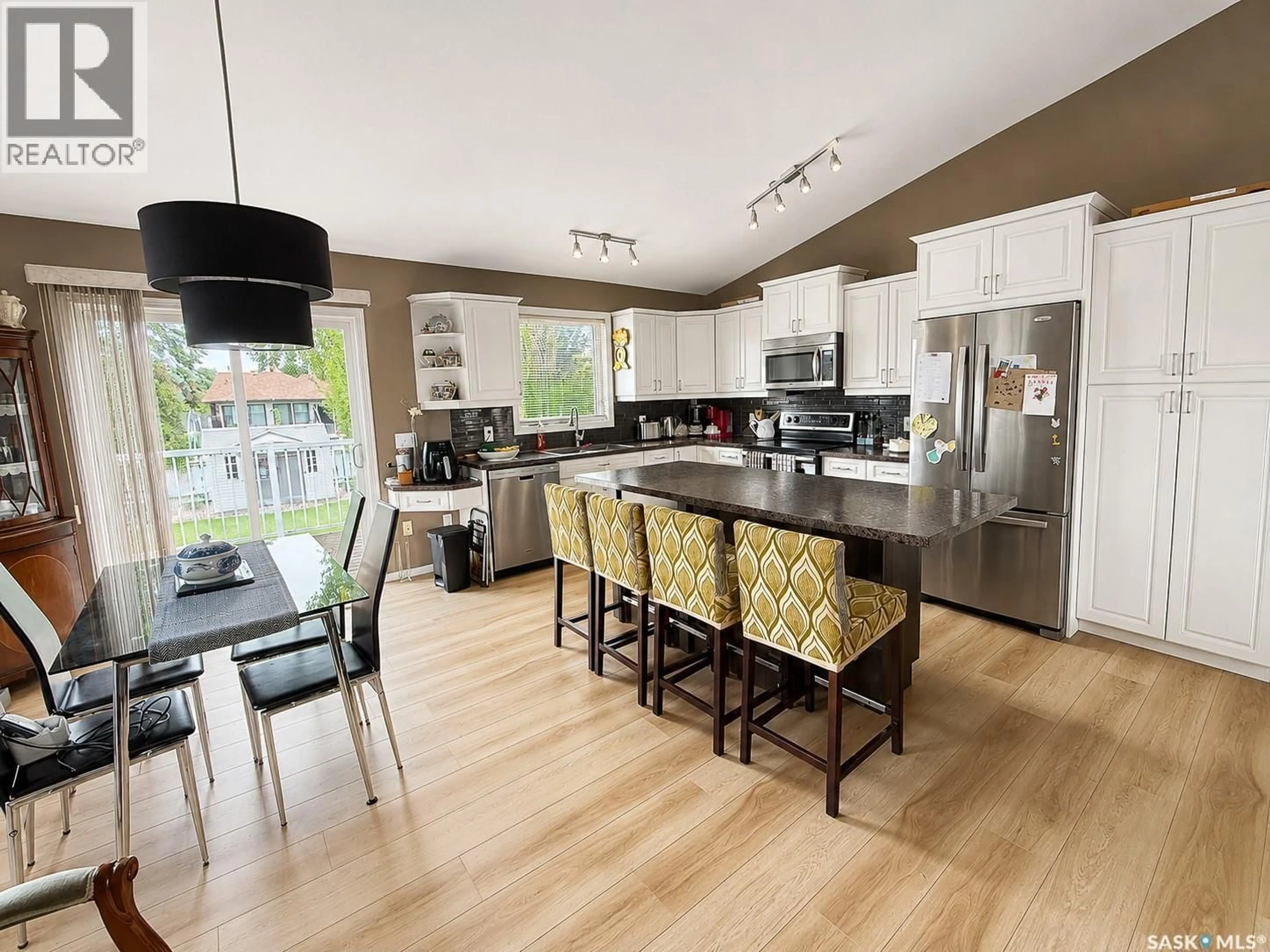 Open concept kitchen, wood/laminate floor for 192 JANET DRIVE, Battleford Saskatchewan S0M1X0