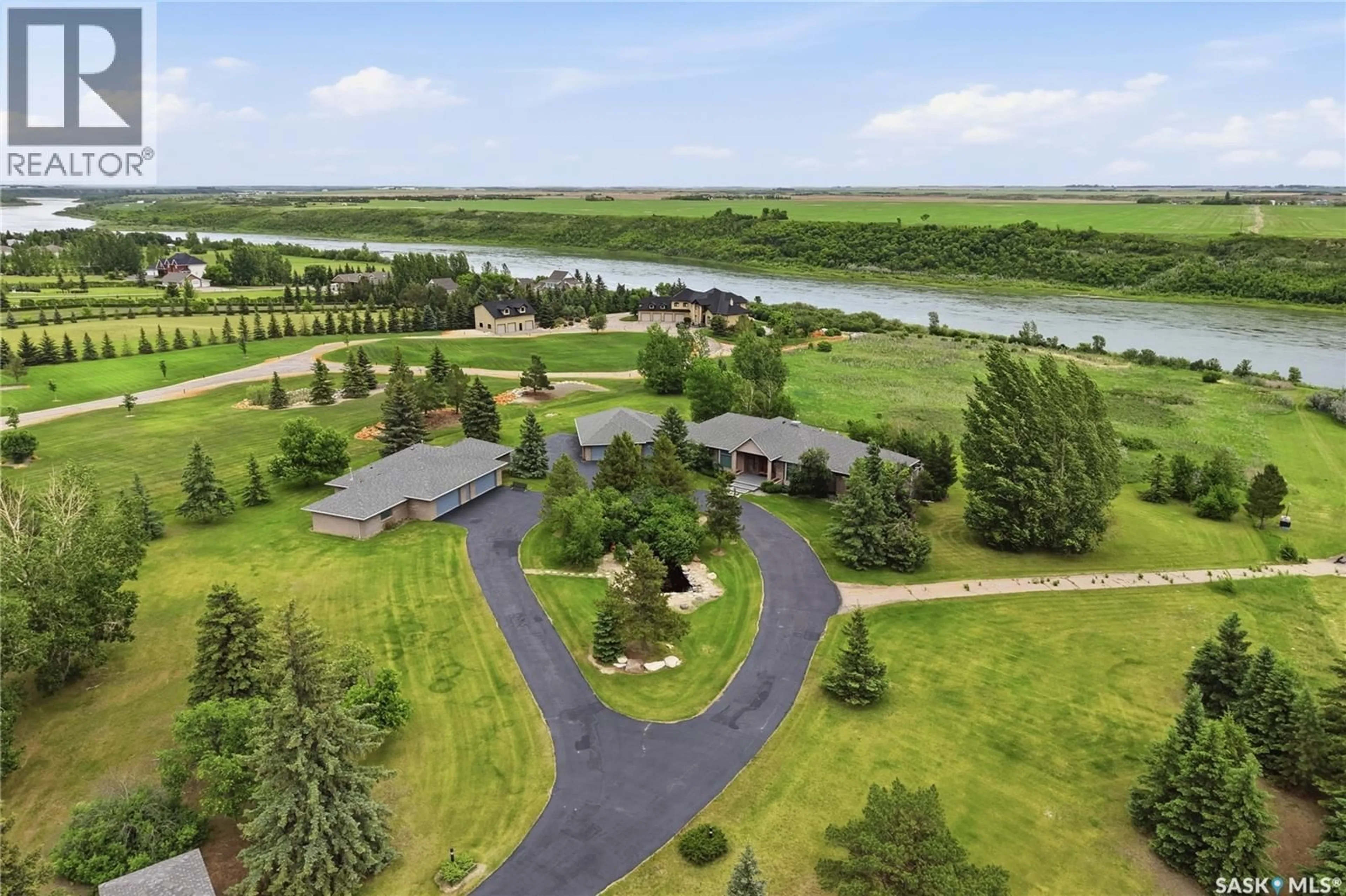 A pic from outside/outdoor area/front of a property/back of a property/a pic from drone, water/lake/river/ocean view for 48 CATHEDRAL BLUFFS ROAD, Corman Park Rm No. 344 Saskatchewan S7P1A3