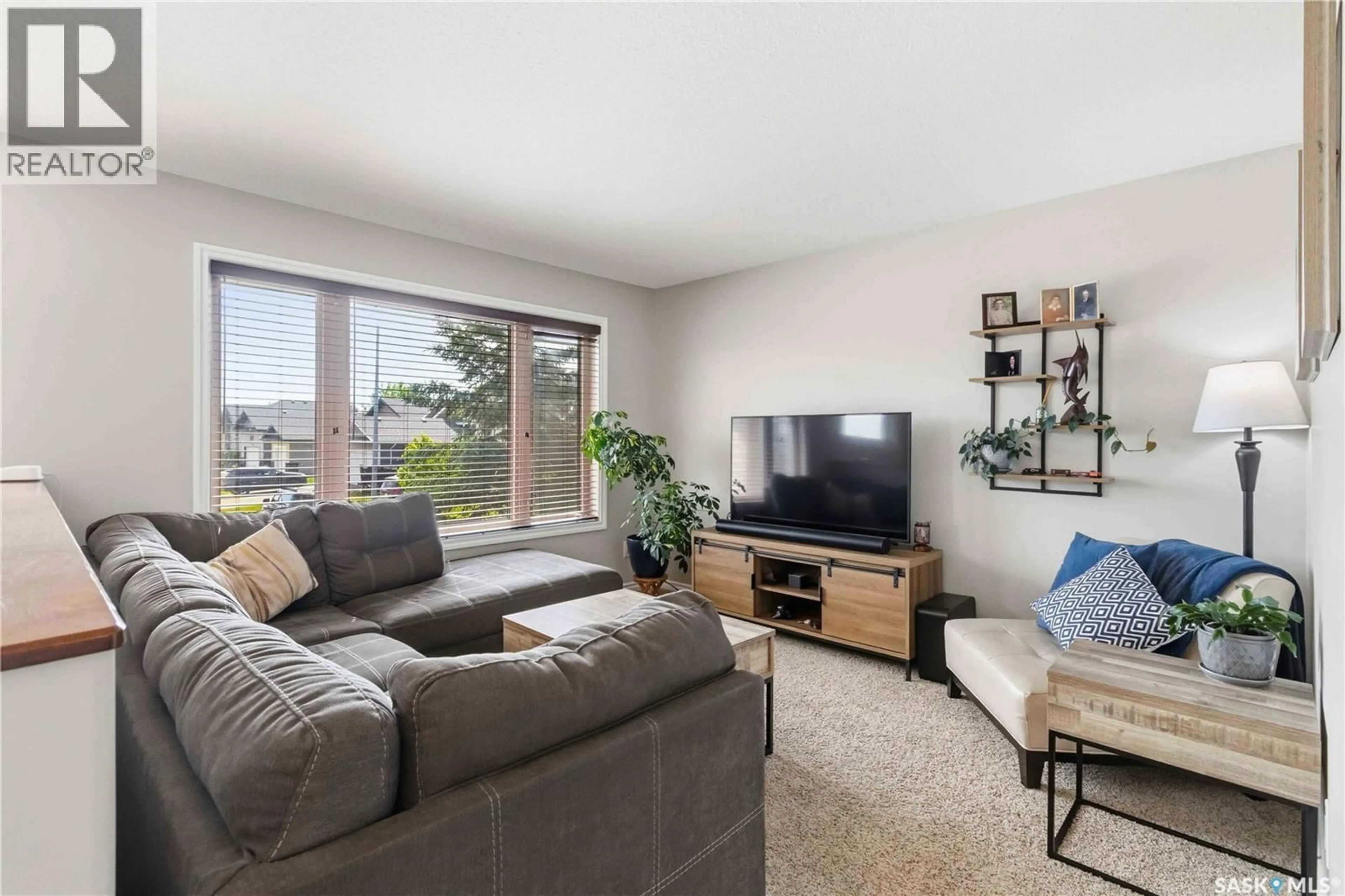 Living room with furniture, unknown for 129 WARWICK CRESCENT, Warman Saskatchewan S0K4S0