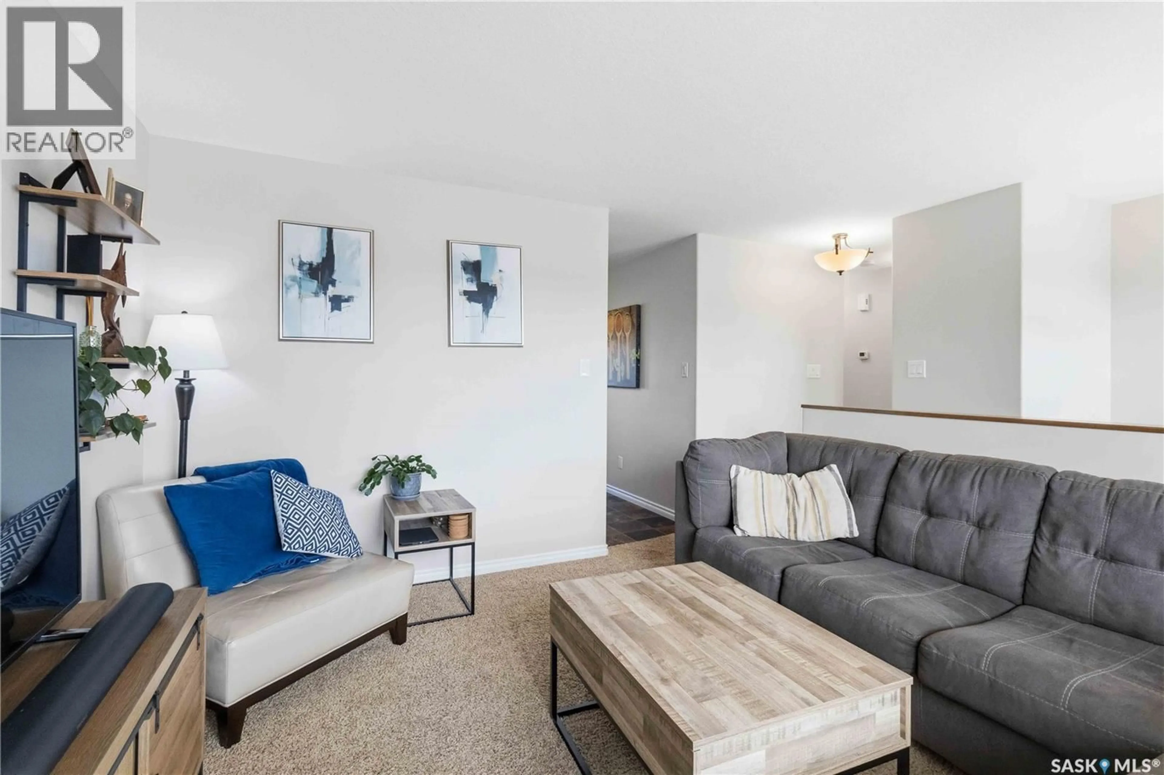 Living room with furniture, unknown for 129 WARWICK CRESCENT, Warman Saskatchewan S0K4S0