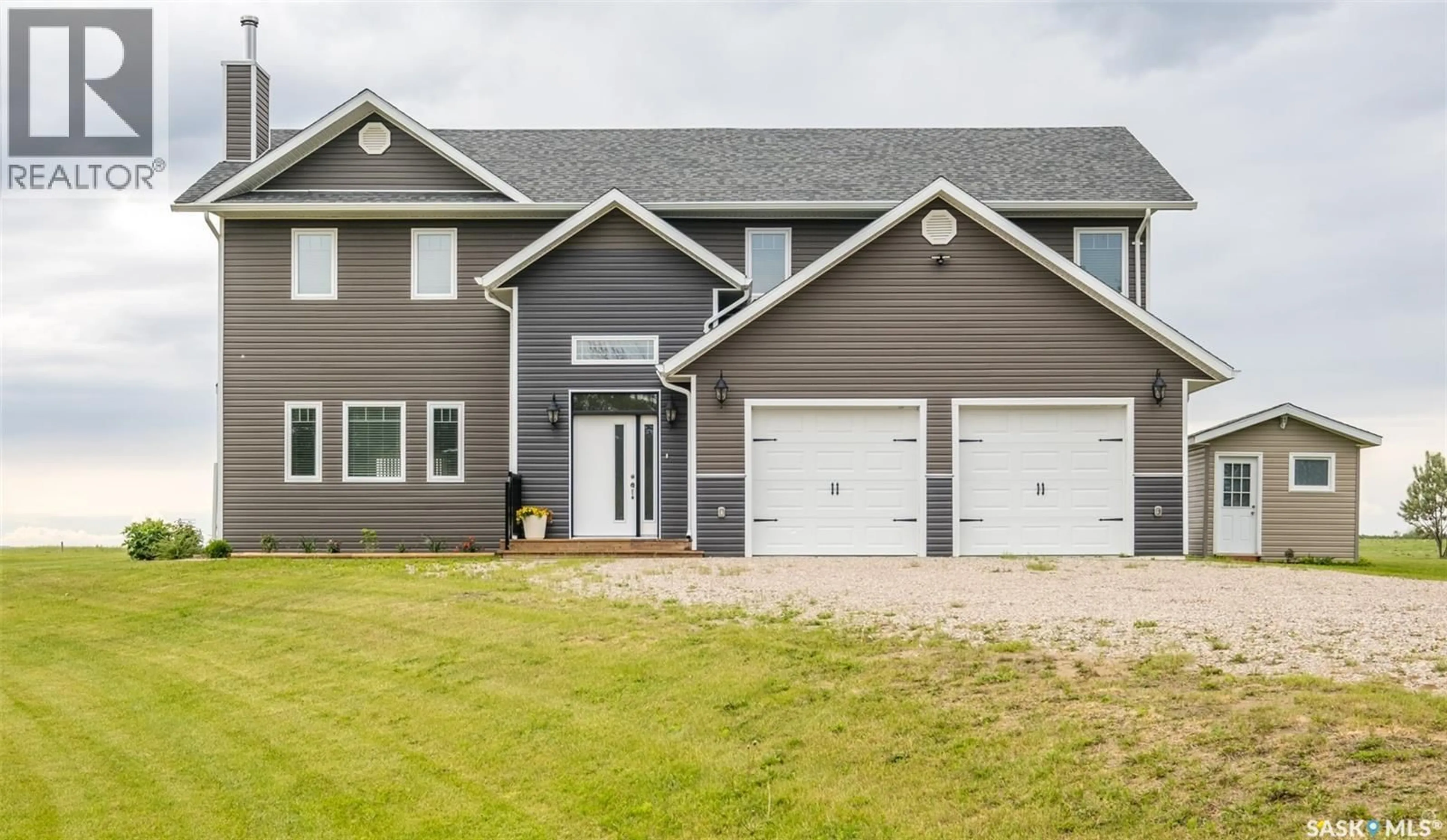 Home with vinyl exterior material, street for 2 HIGHWAY SOUTH ACREAGE, Prince Albert Rm No. 461 Saskatchewan S6V5P9