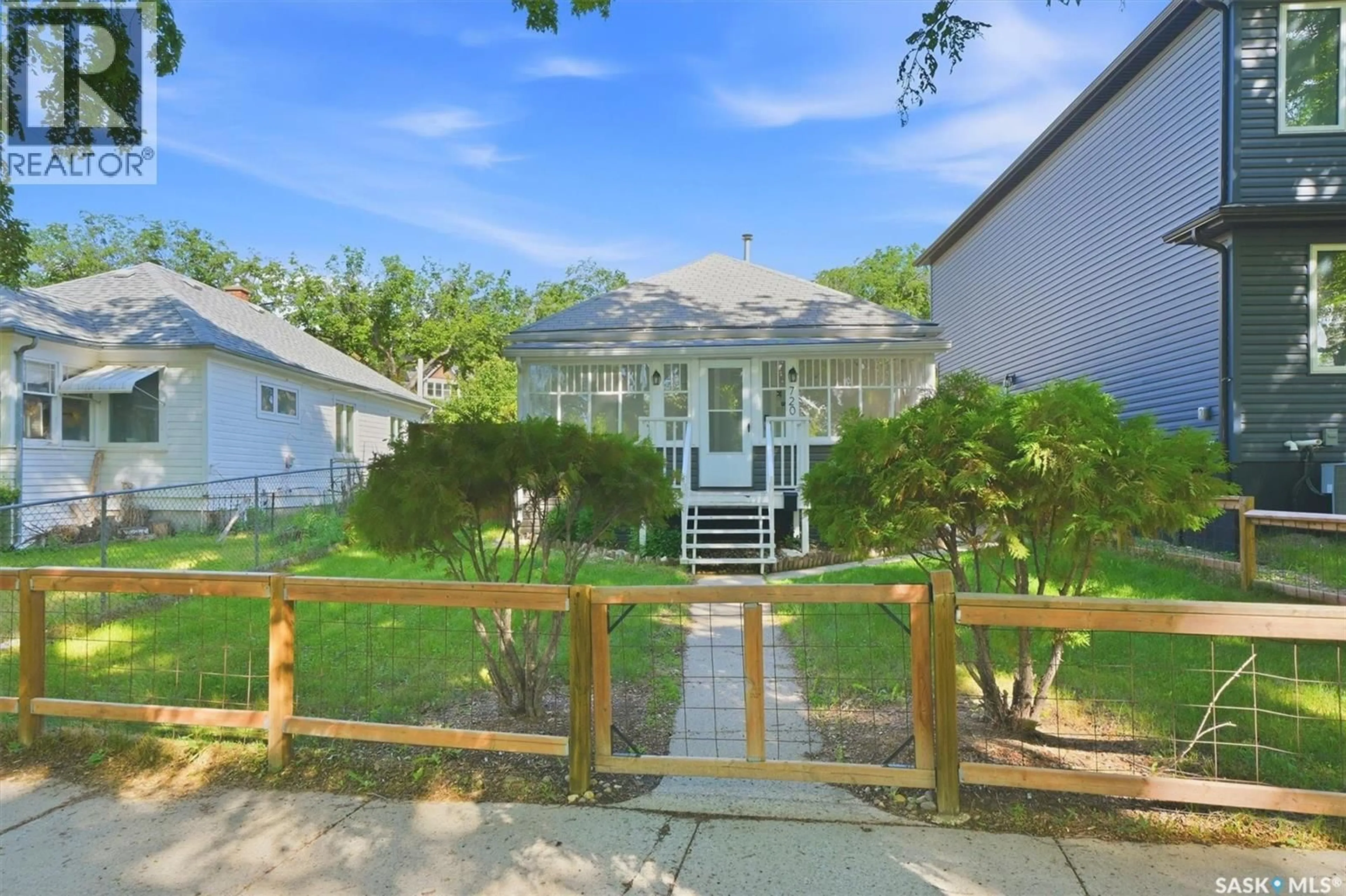 A pic from outside/outdoor area/front of a property/back of a property/a pic from drone, street for 720 WALMER ROAD, Saskatoon Saskatchewan S7L0E4