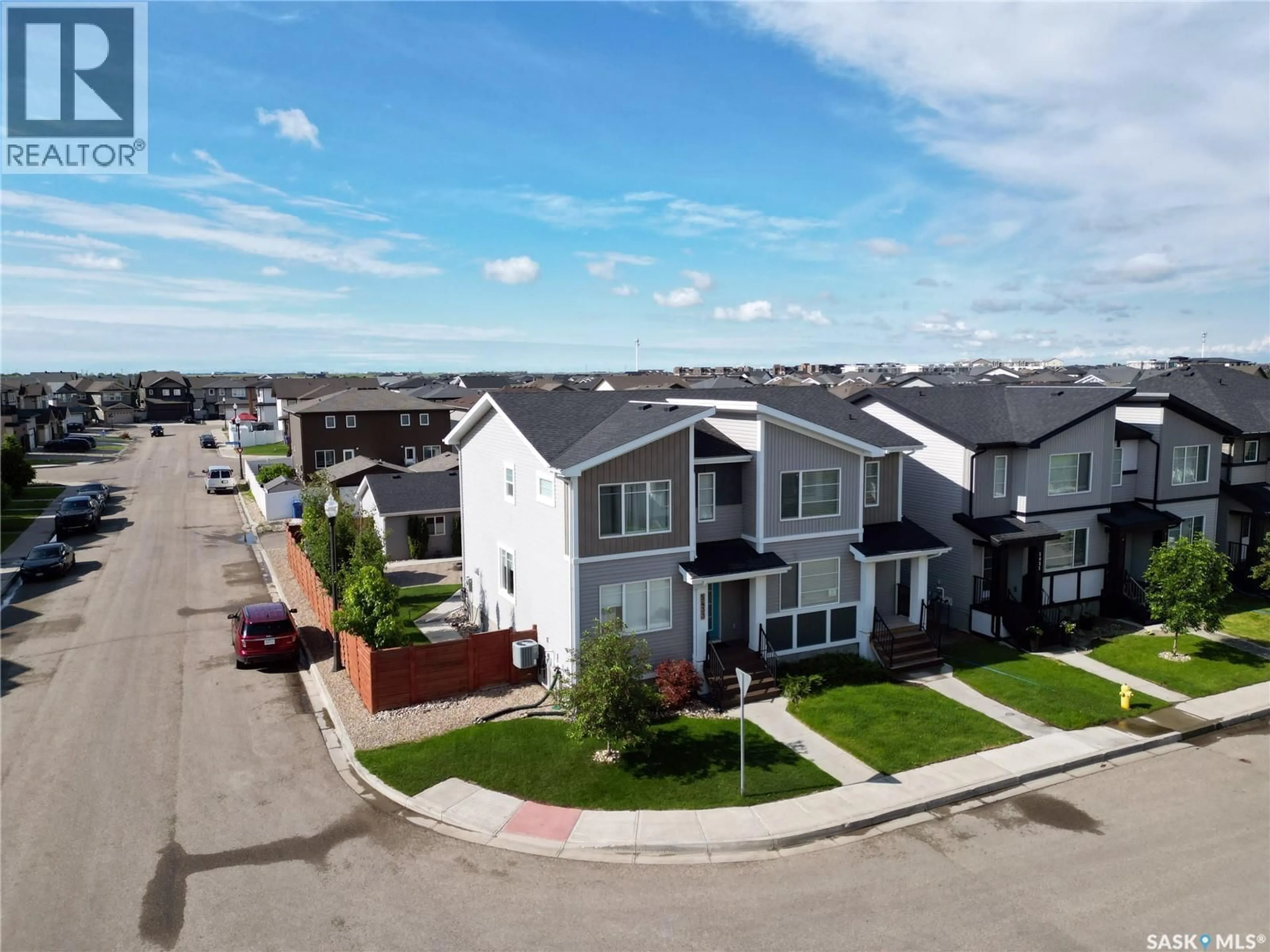 A pic from outside/outdoor area/front of a property/back of a property/a pic from drone, street for E - 5433 GREEN SILVERBERRY DRIVE, Regina Saskatchewan S4V3M5