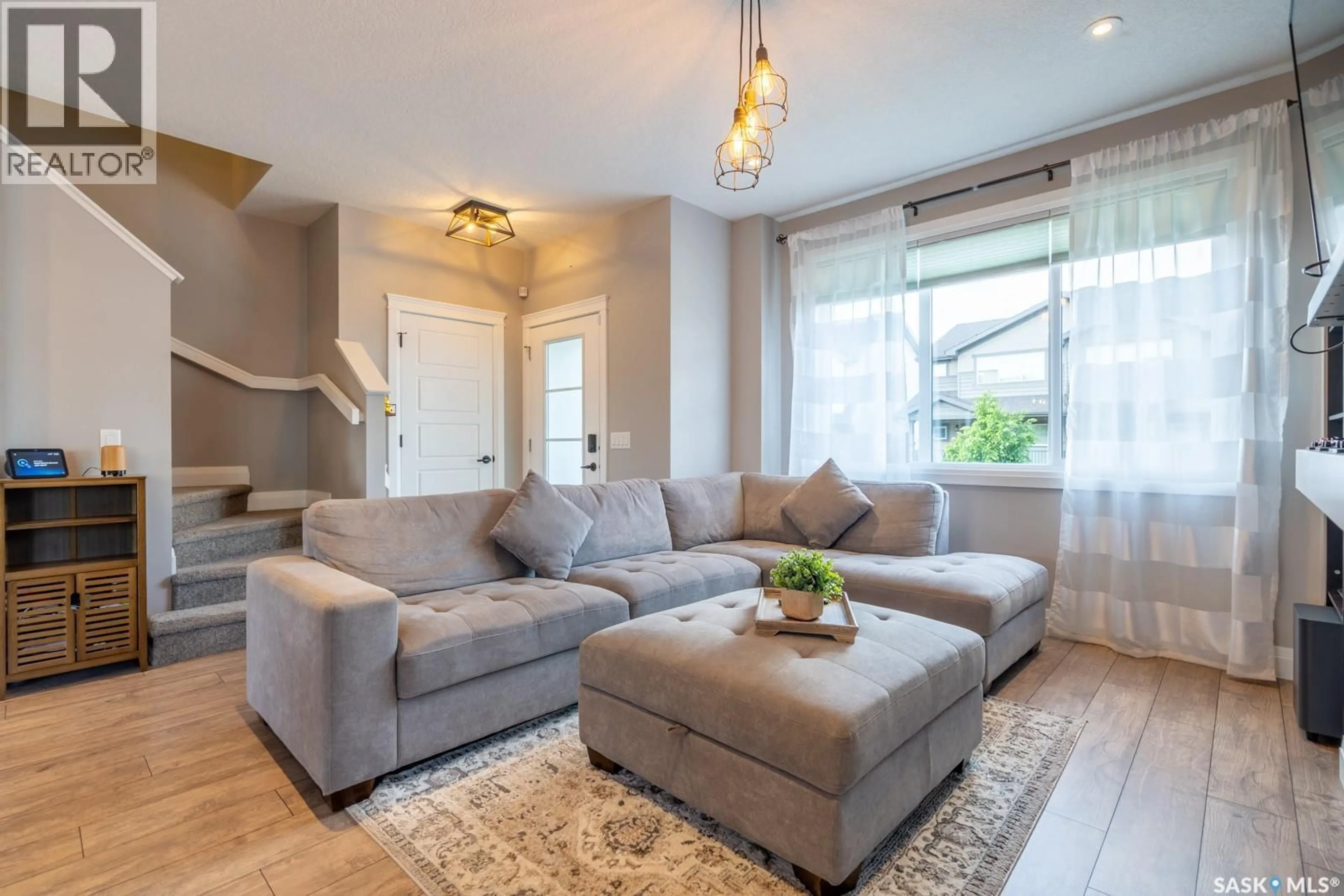 Living room with furniture, unknown for E - 5433 GREEN SILVERBERRY DRIVE, Regina Saskatchewan S4V3M5
