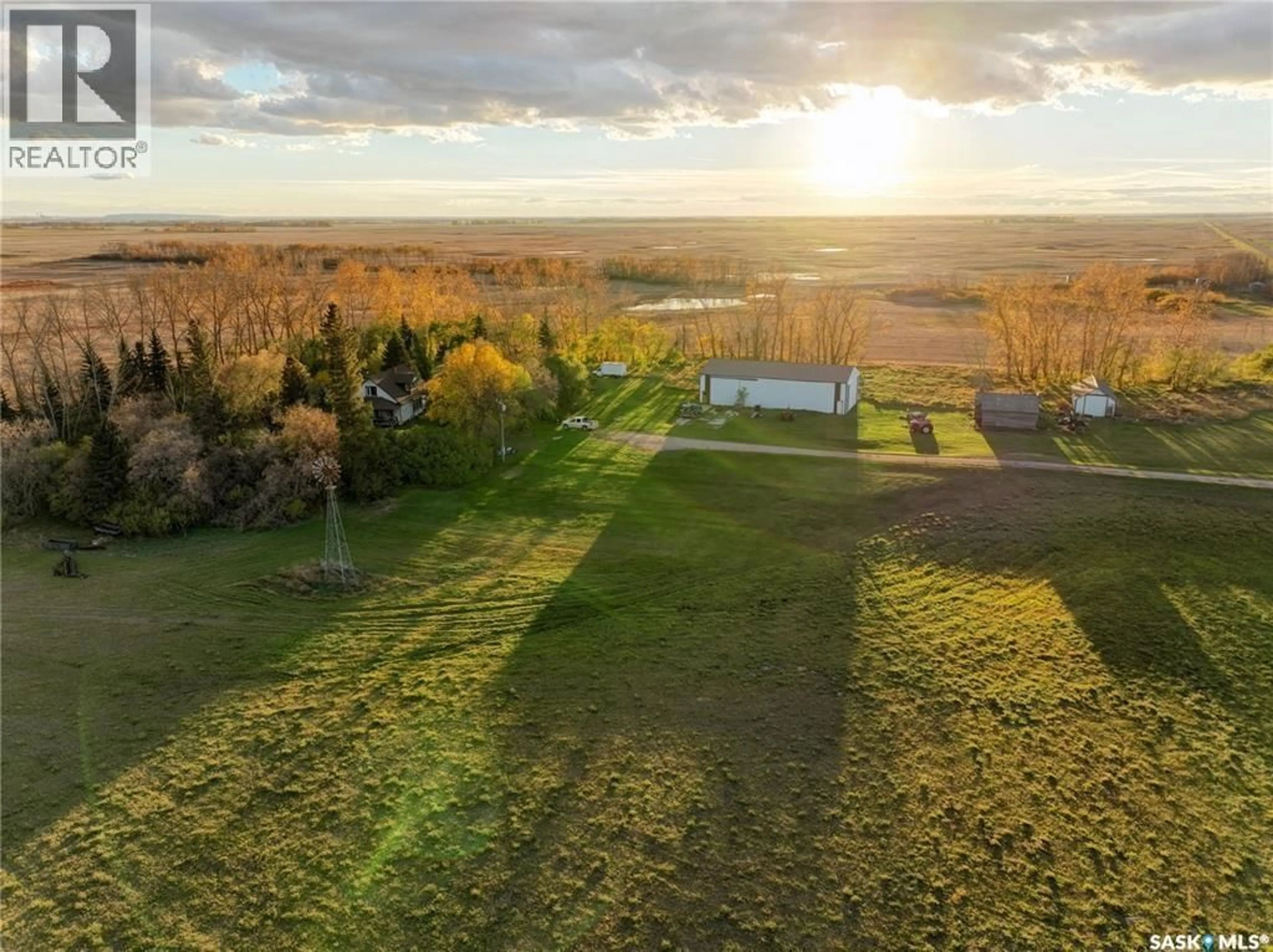 A pic from outside/outdoor area/front of a property/back of a property/a pic from drone, forest/trees view for LOMENDA ACREAGE, Langenburg Rm No. 181 Saskatchewan S0A0M0