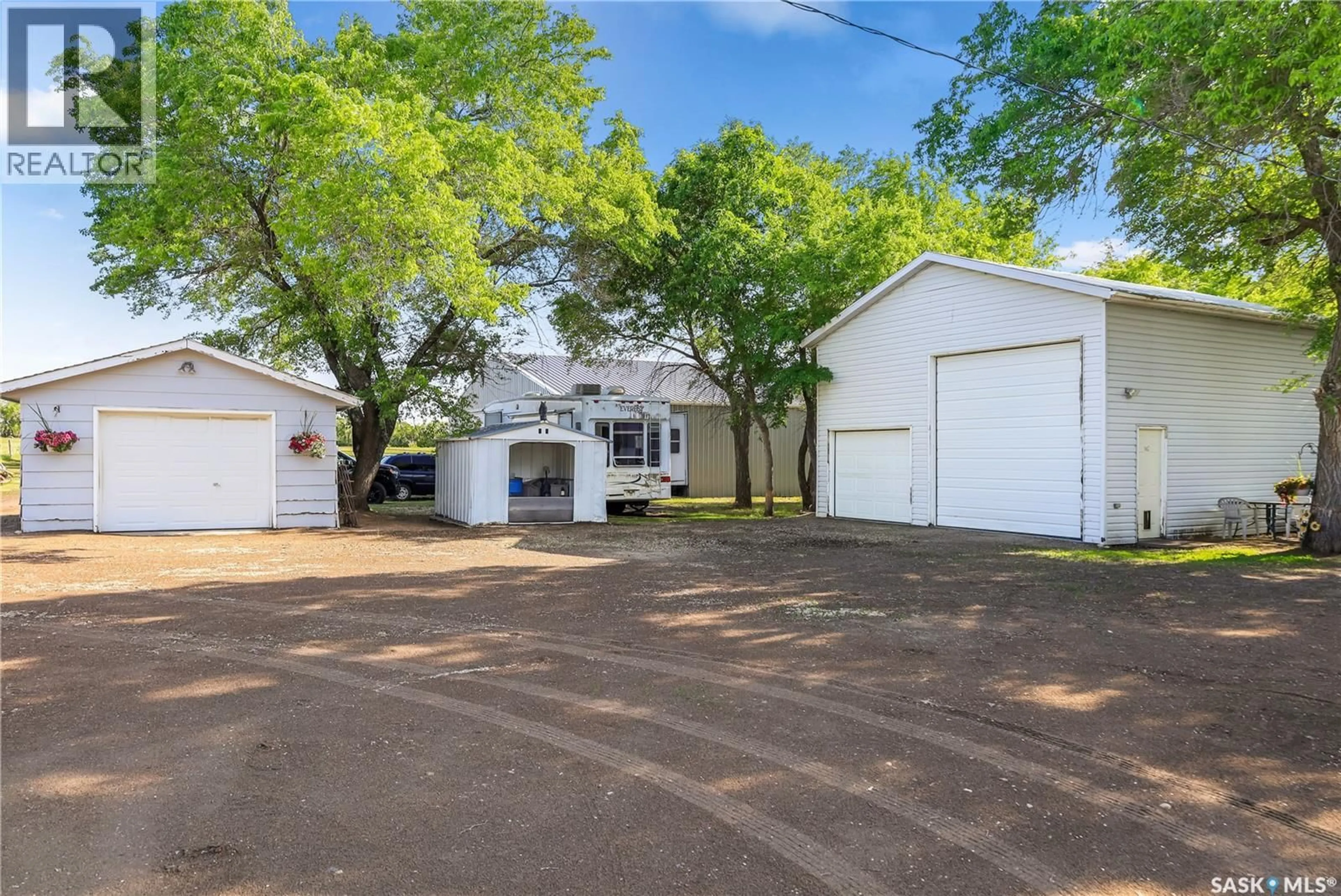 A pic from outside/outdoor area/front of a property/back of a property/a pic from drone, street for 20 VANSCOY RD, Vanscoy Rm No. 345 Saskatchewan S7K3J6
