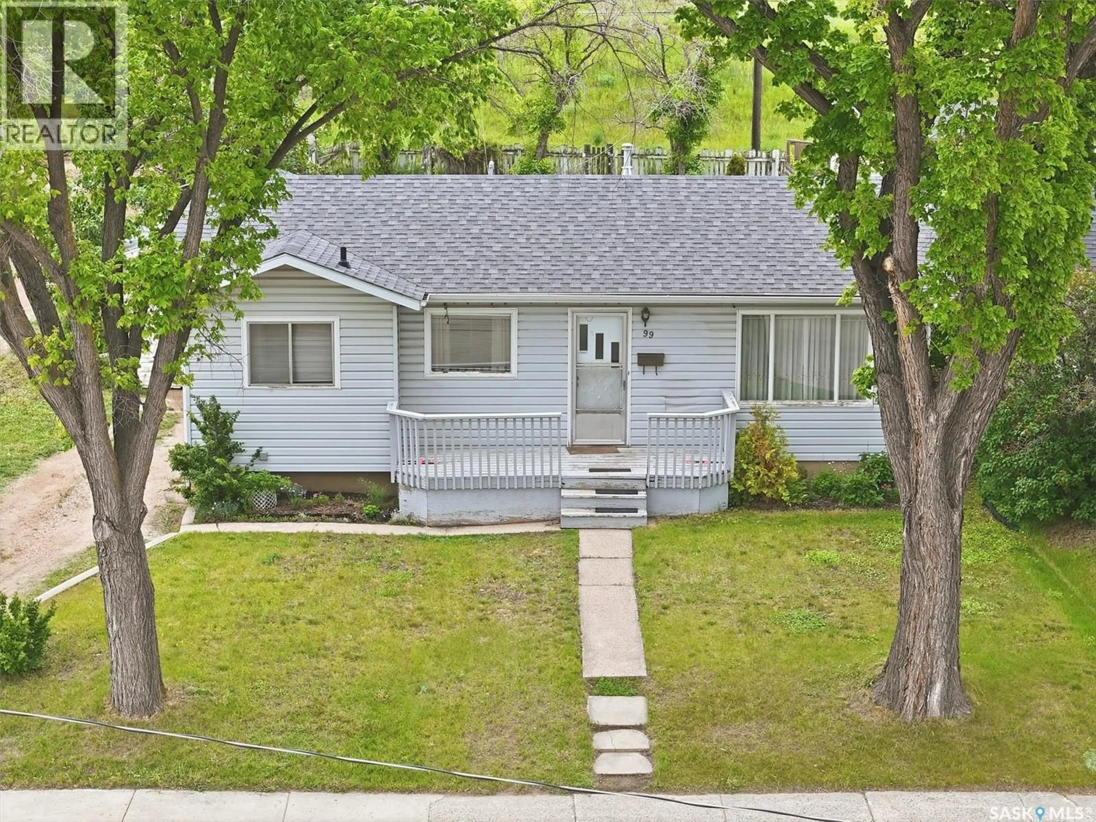 Home with vinyl exterior material, street for 99 HOWELL AVENUE, Saskatoon Saskatchewan S7L3S9