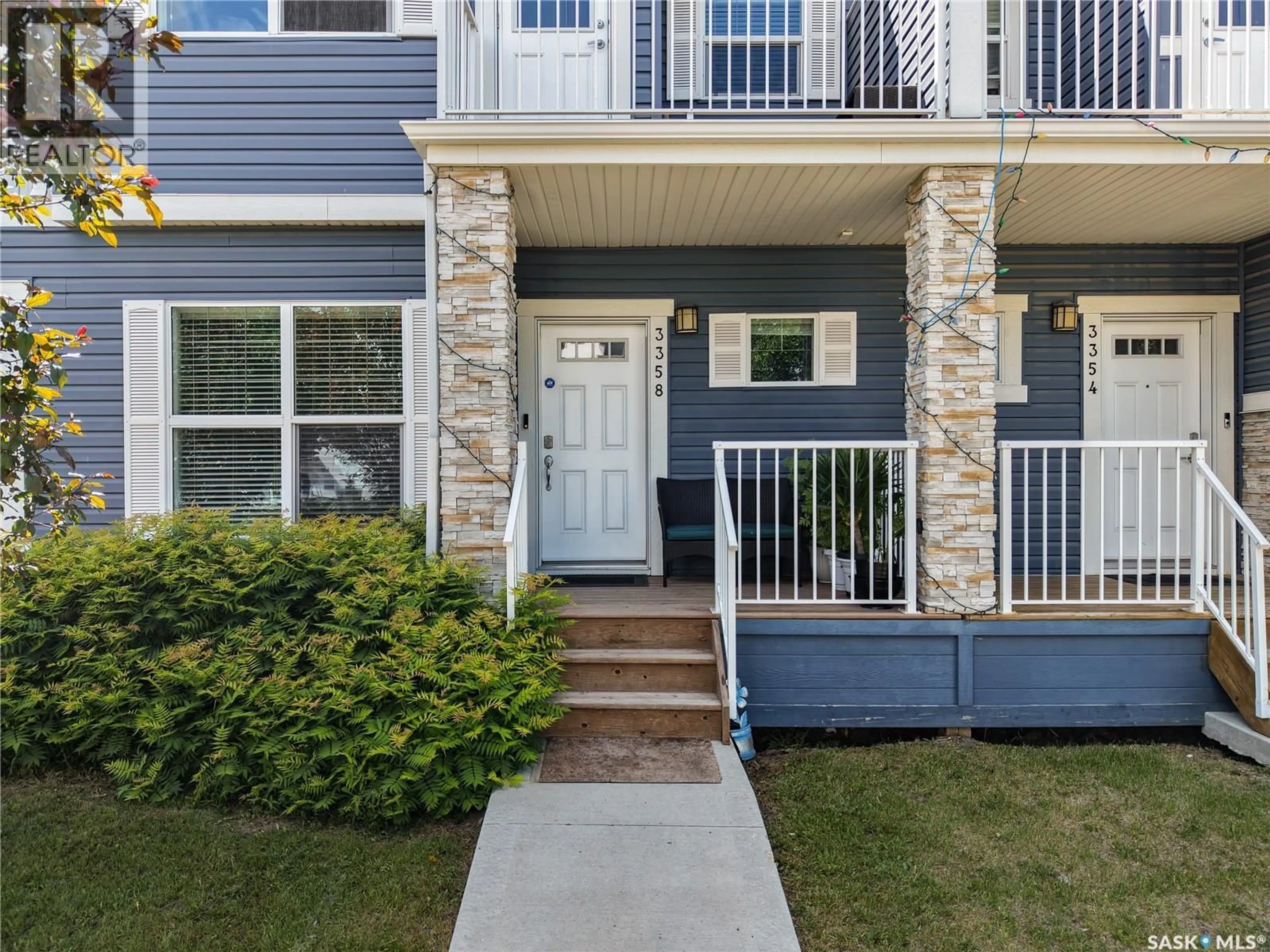 Home with vinyl exterior material, street for E - 3358 CHUKA BOULEVARD, Regina Saskatchewan S4V3K7