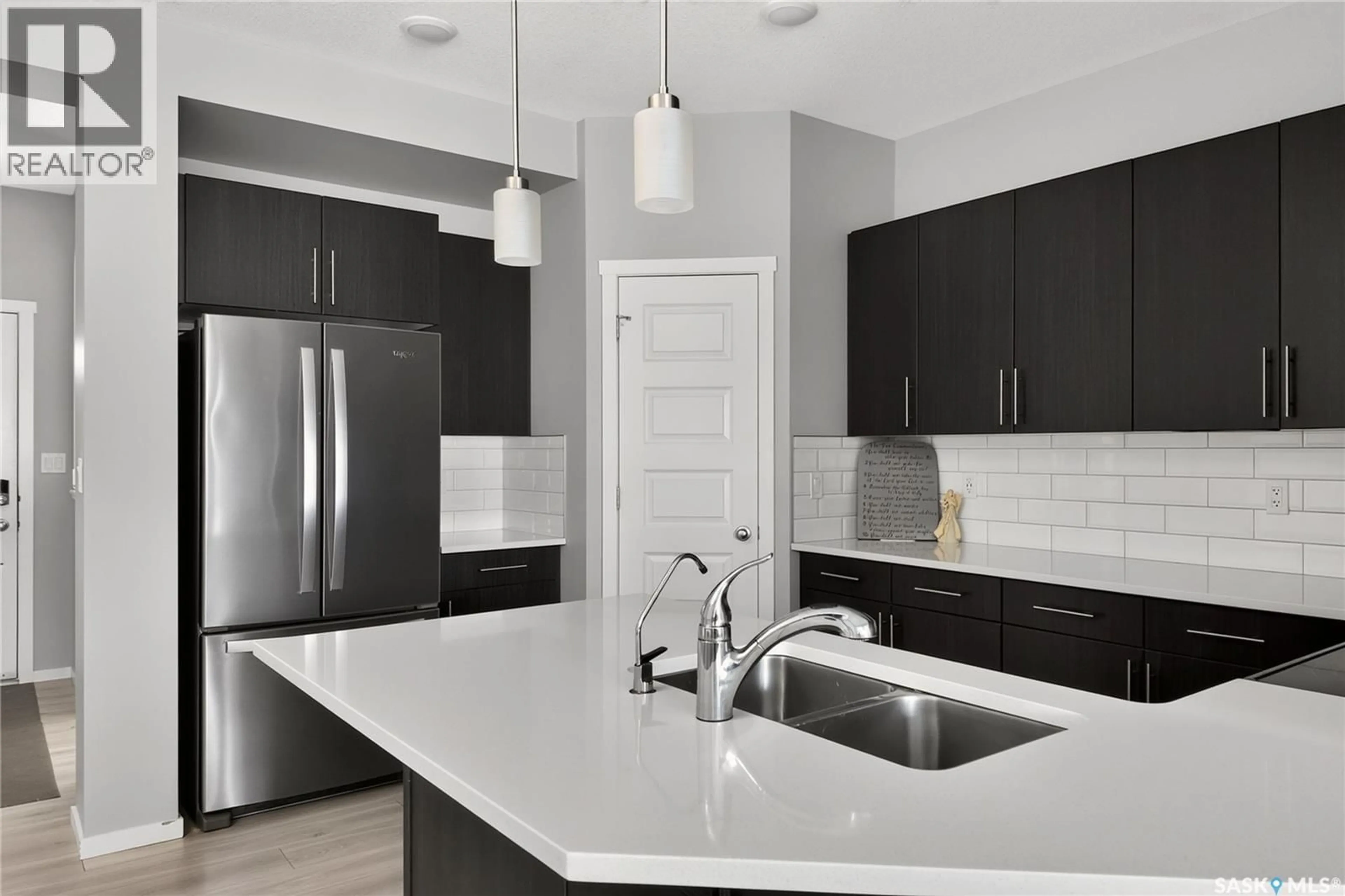 Open concept kitchen, ceramic/tile floor for E - 3358 CHUKA BOULEVARD, Regina Saskatchewan S4V3K7