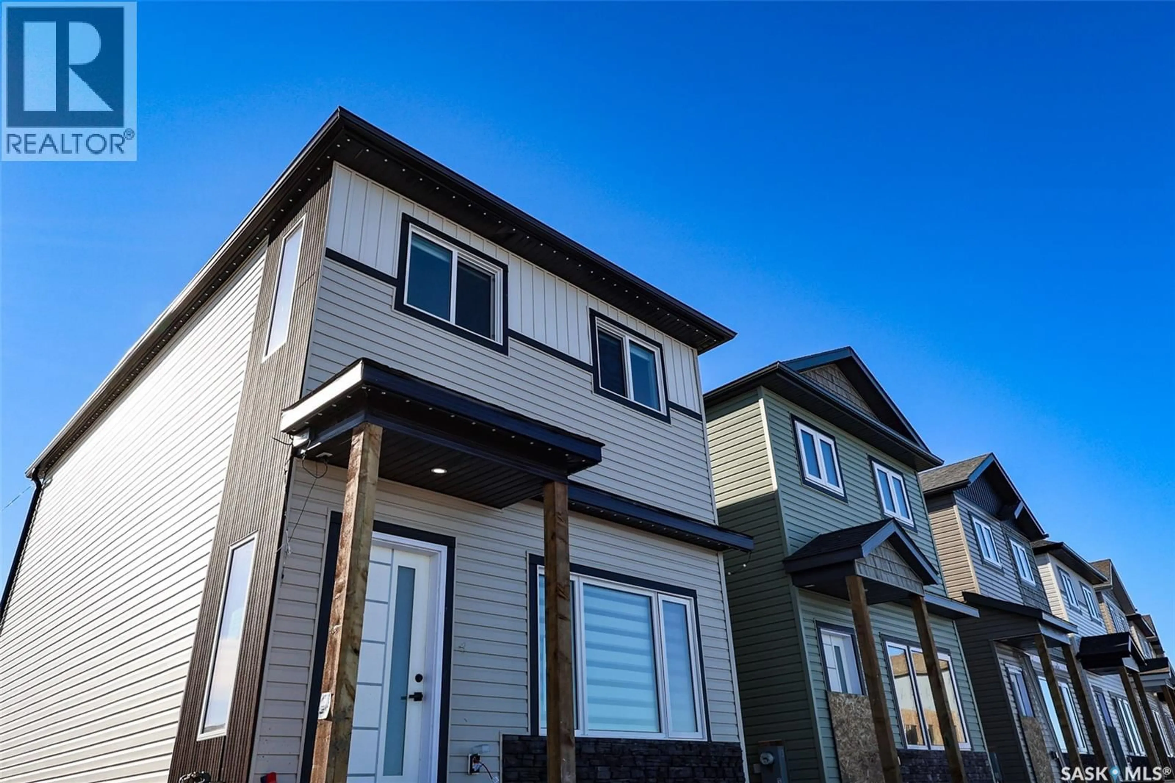 Home with vinyl exterior material, street for 1615 - 155 RICHARDSON ROAD, Saskatoon Saskatchewan S7R0N3