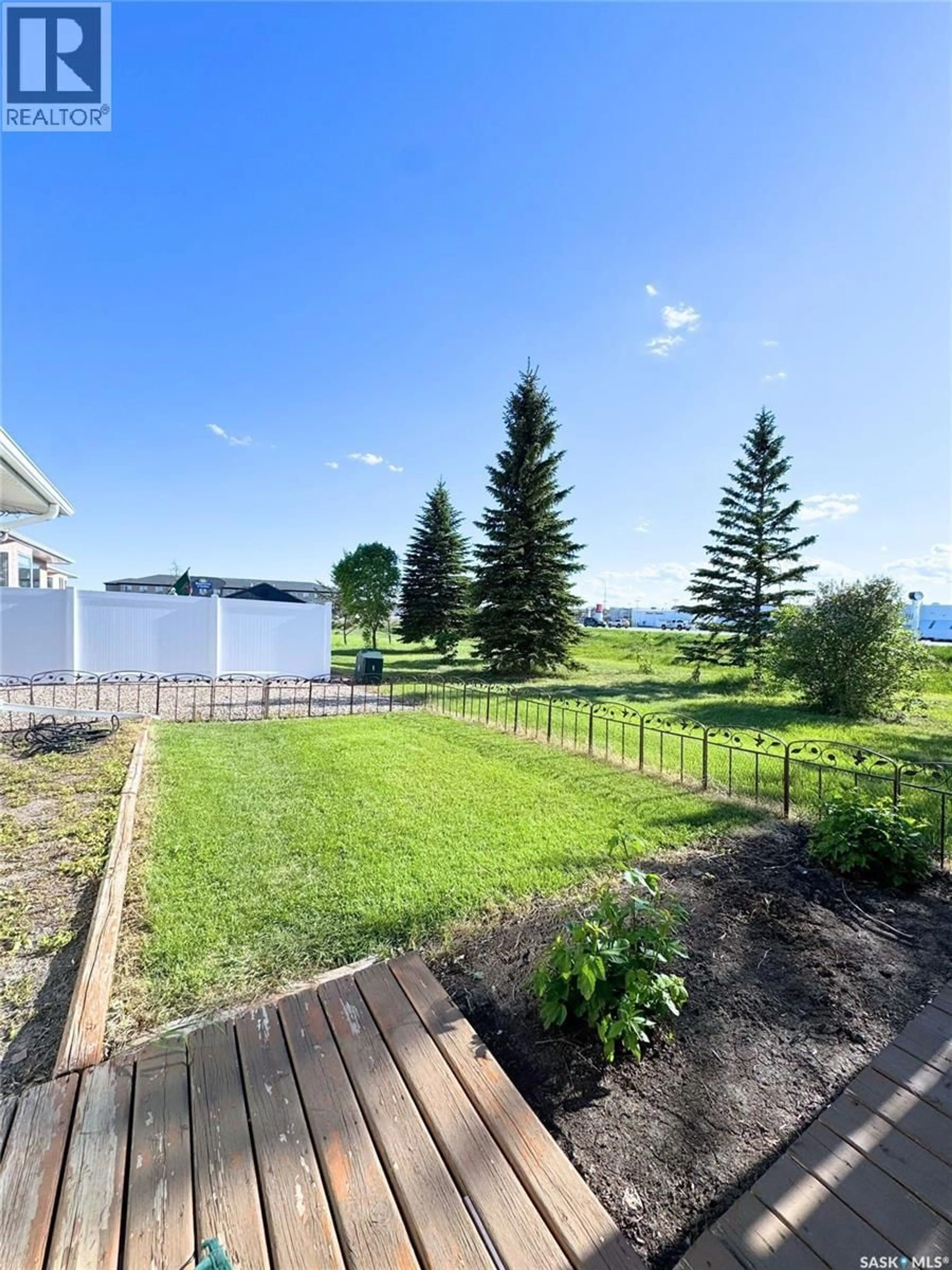 A pic from outside/outdoor area/front of a property/back of a property/a pic from drone, water/lake/river/ocean view for 30 - 103 RUSSELL DRIVE, Yorkton Saskatchewan S3N4C6