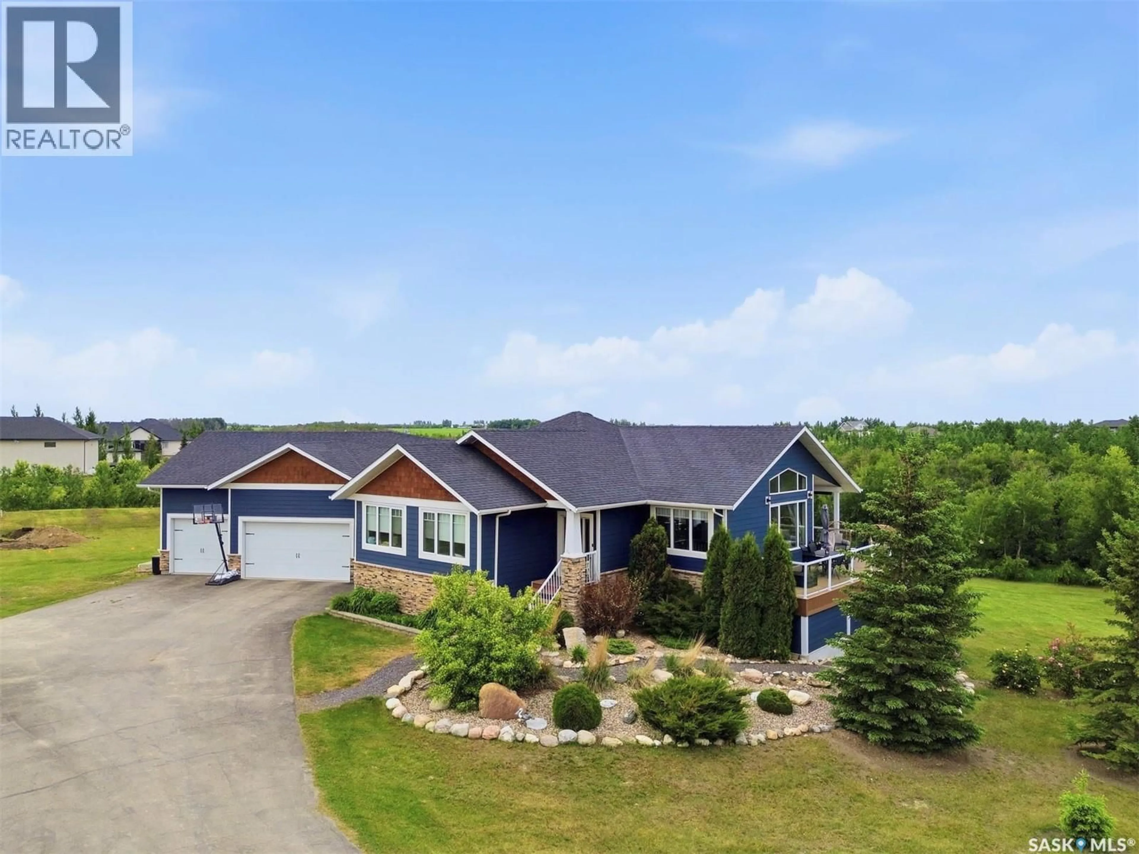 A pic from outside/outdoor area/front of a property/back of a property/a pic from drone, unknown for 63 PARK LANE, Osler Saskatchewan S0K3A0