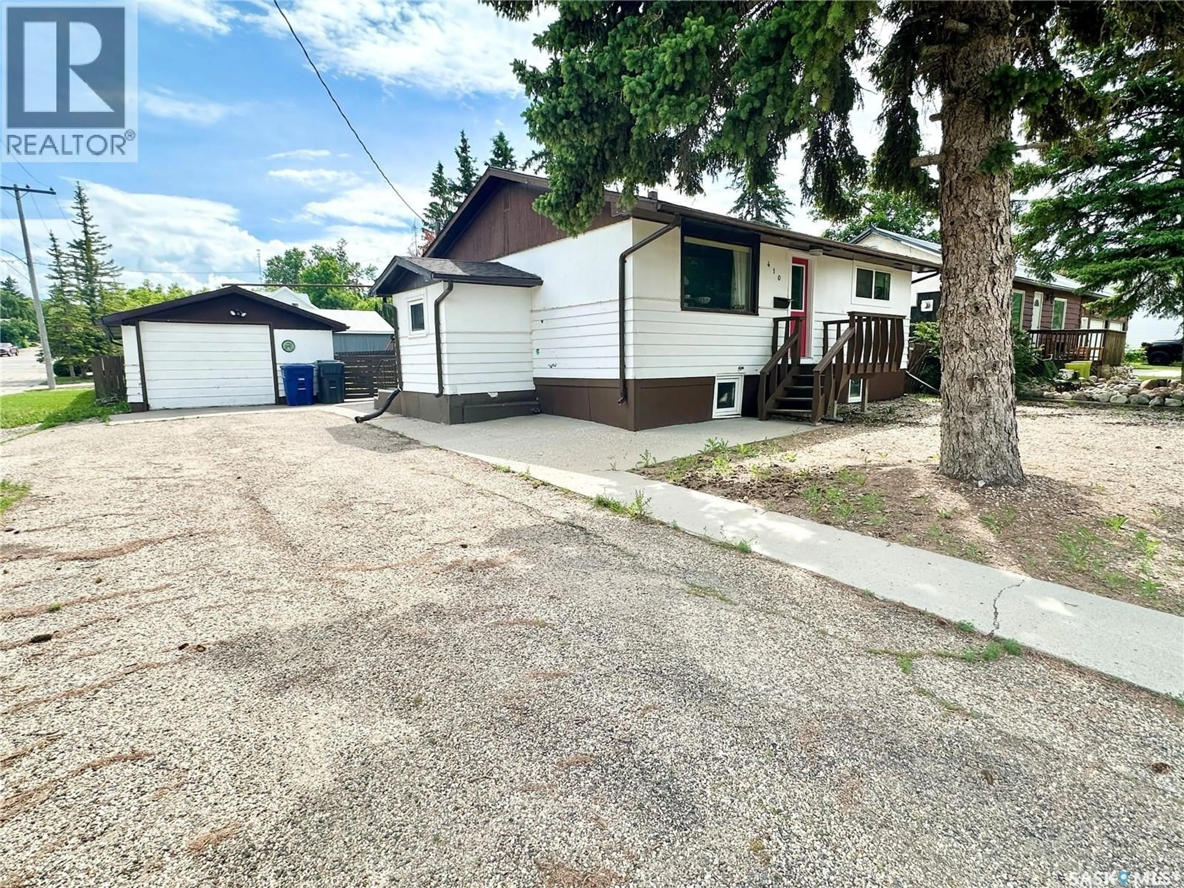 A pic from outside/outdoor area/front of a property/back of a property/a pic from drone, street for 410 2ND AVENUE, Weyburn Saskatchewan S4H1X1