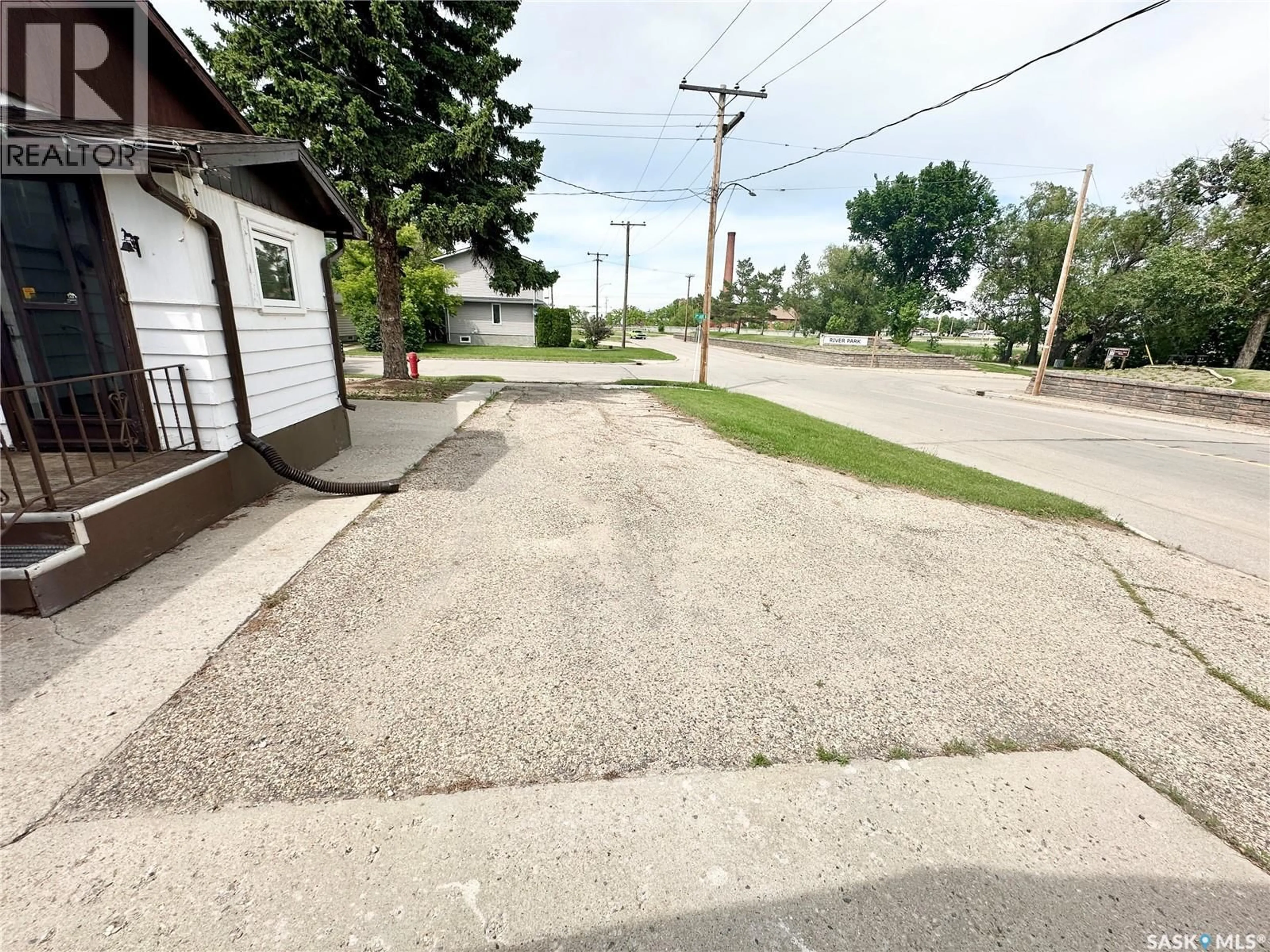 A pic from outside/outdoor area/front of a property/back of a property/a pic from drone, street for 410 2ND AVENUE, Weyburn Saskatchewan S4H1X1
