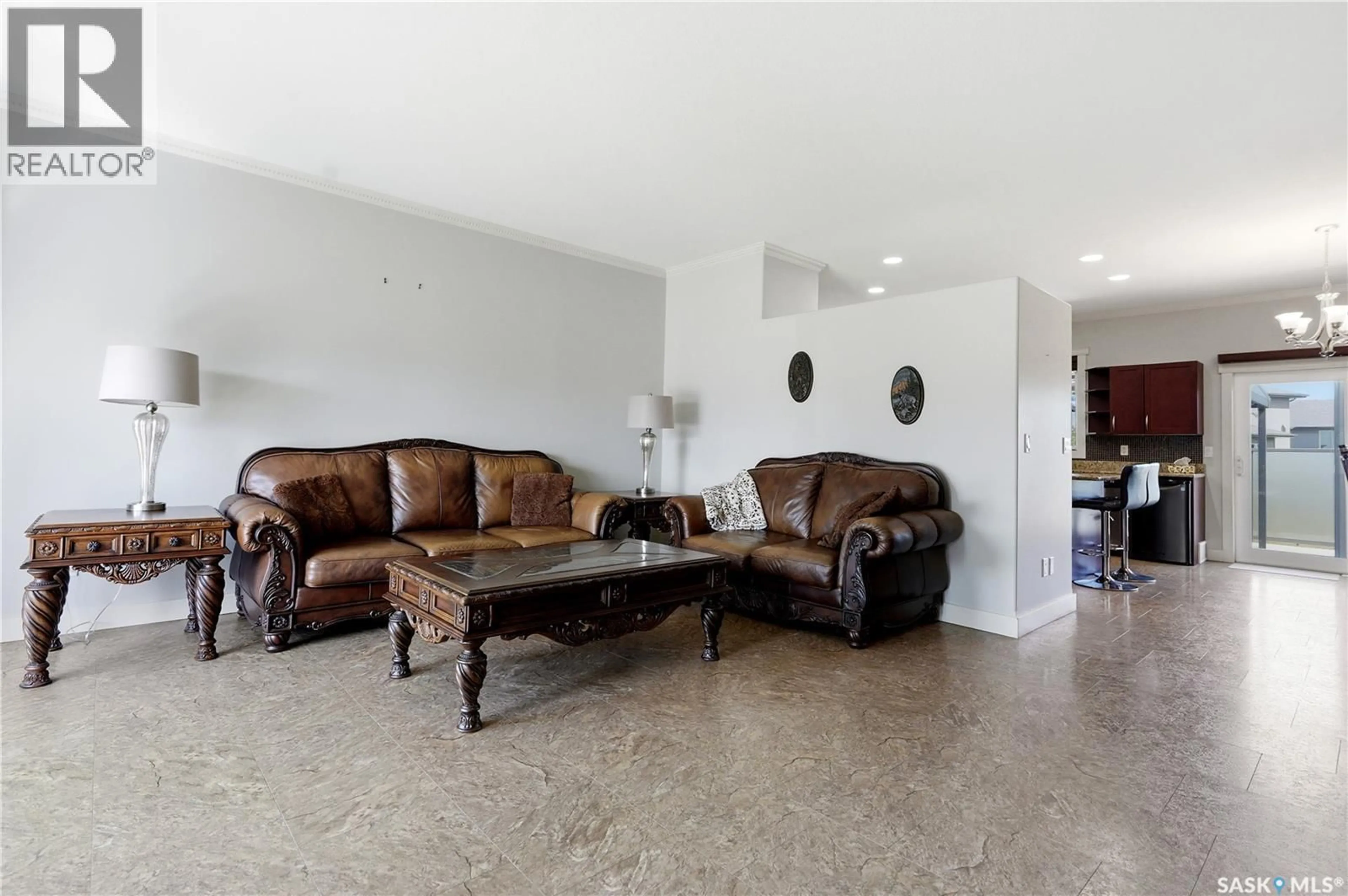 Living room with furniture, ceramic/tile floor for 625 REIMER ROAD, Martensville Saskatchewan S0K0A2