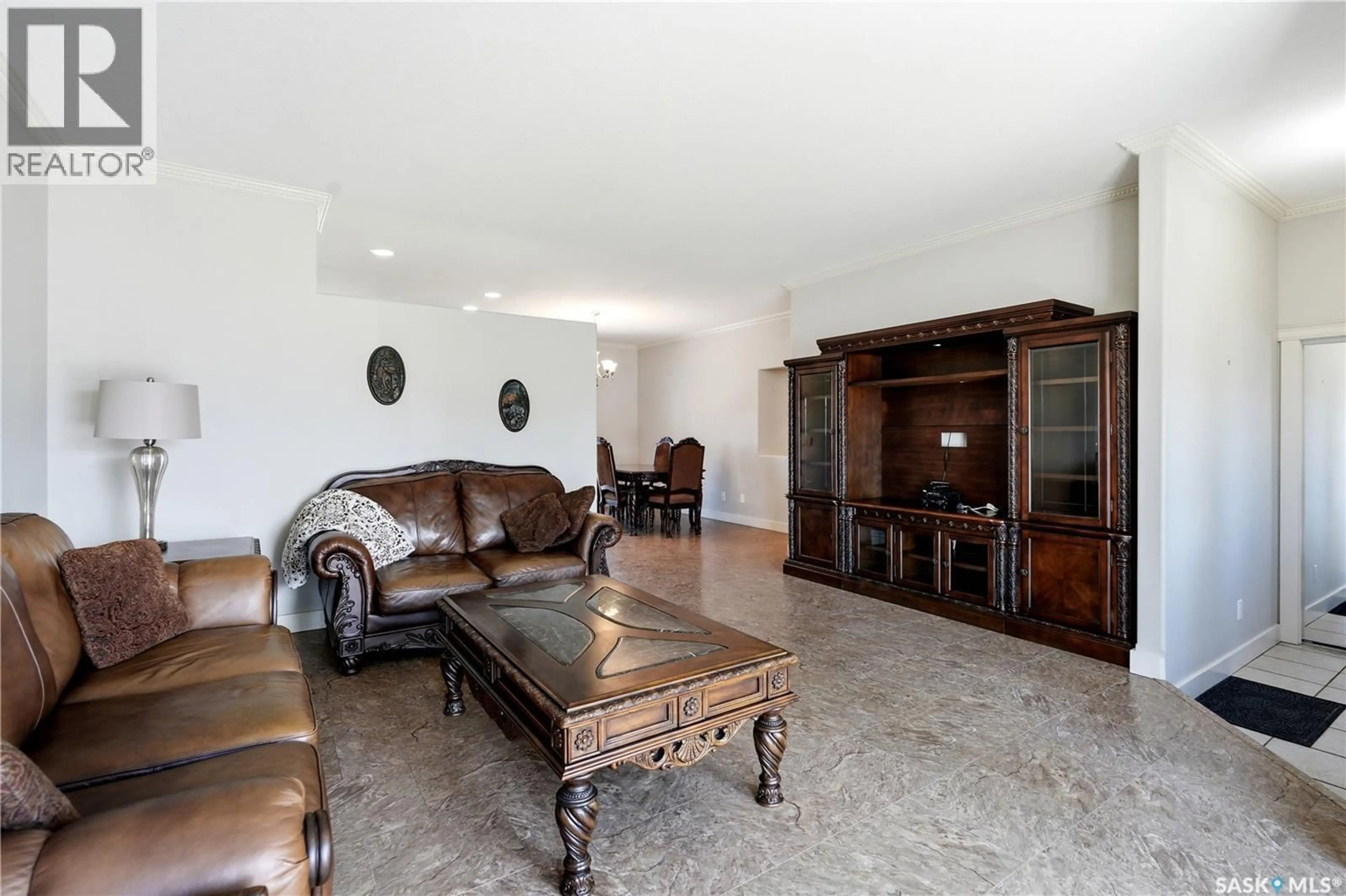 Living room with furniture, ceramic/tile floor for 625 REIMER ROAD, Martensville Saskatchewan S0K0A2