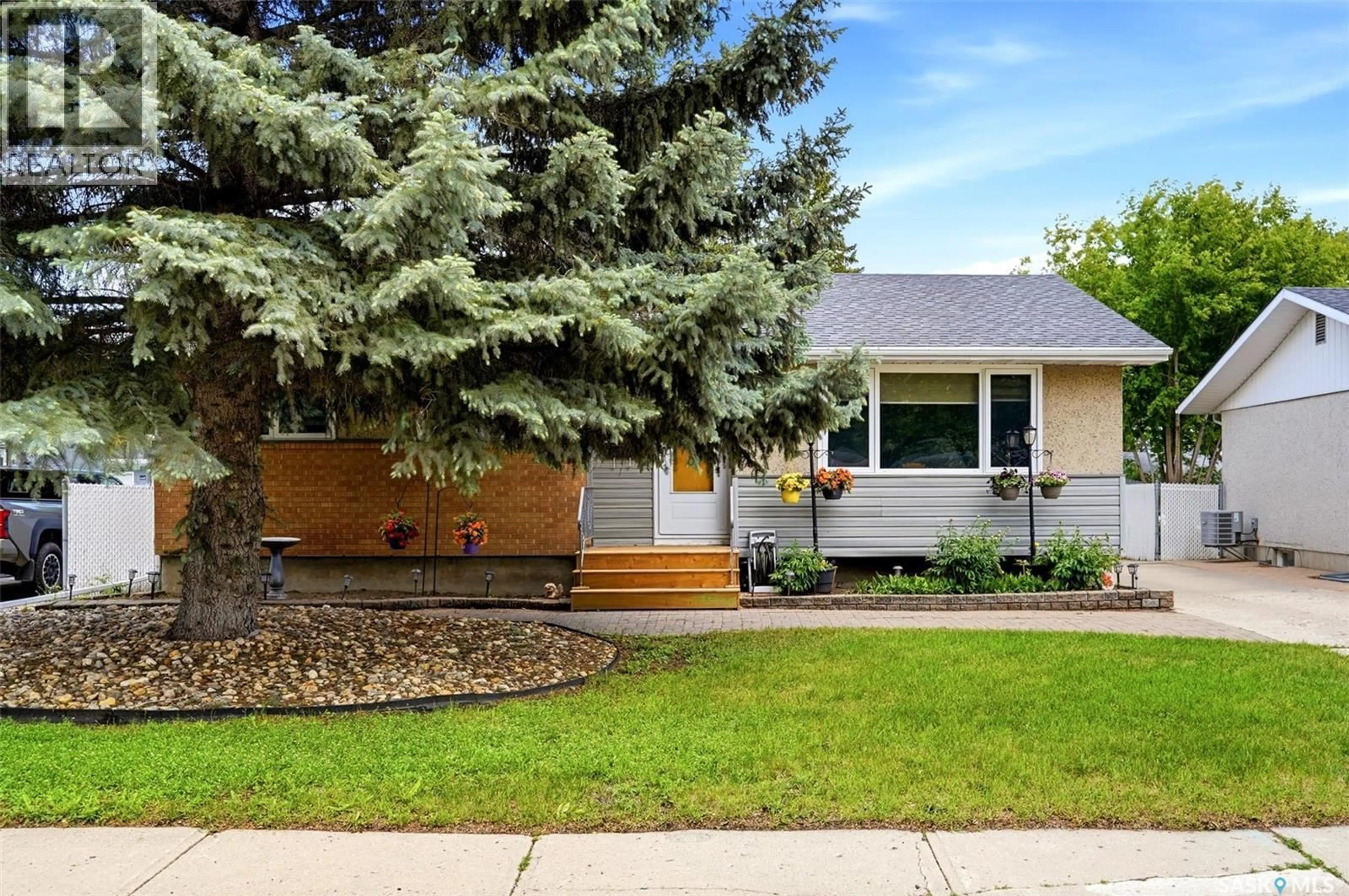 Home with vinyl exterior material, street for 419 GARNET STREET, Regina Saskatchewan S4R3T2