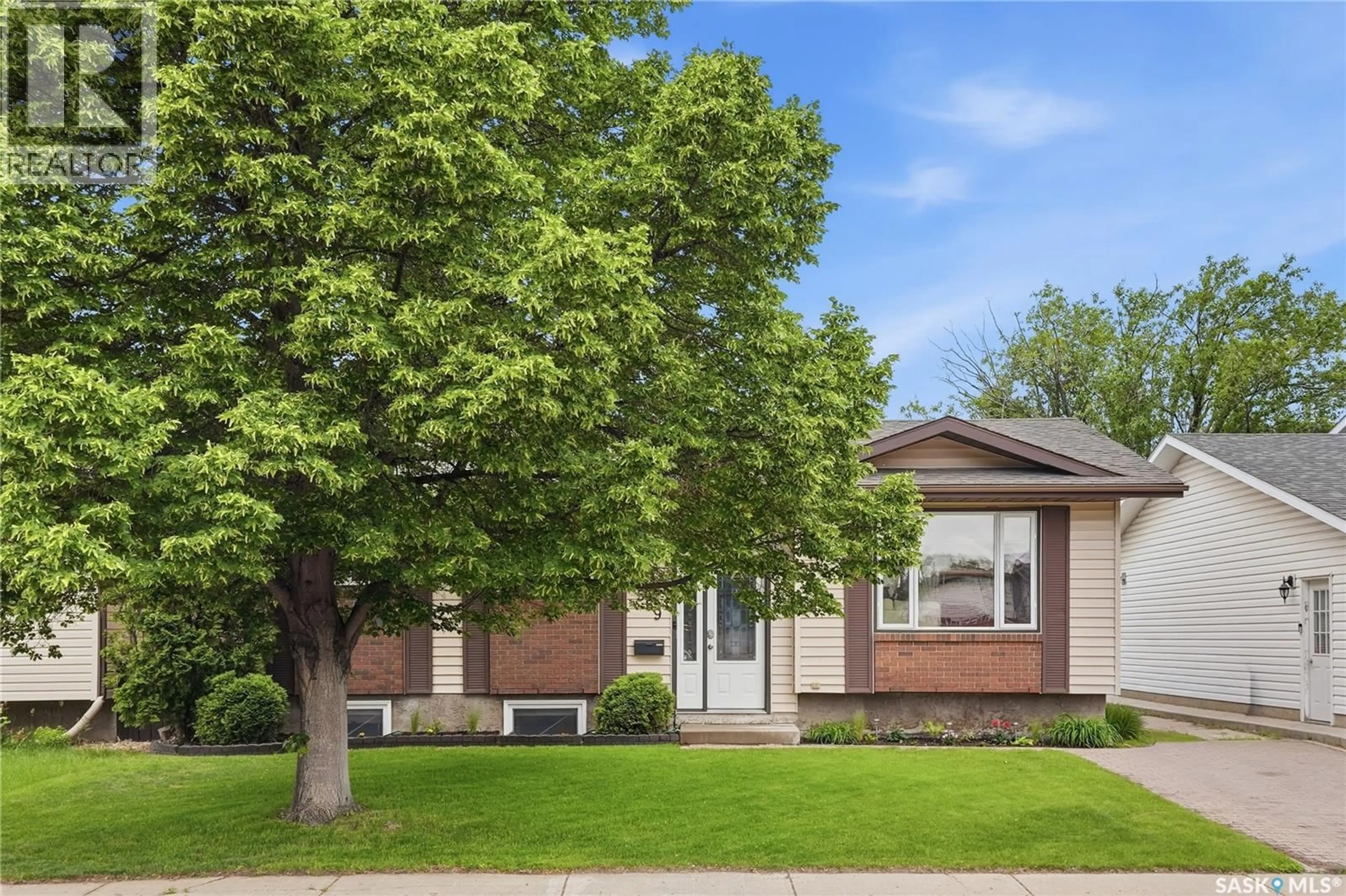 Home with vinyl exterior material, street for 559 NORDSTRUM ROAD, Saskatoon Saskatchewan S7K7X6