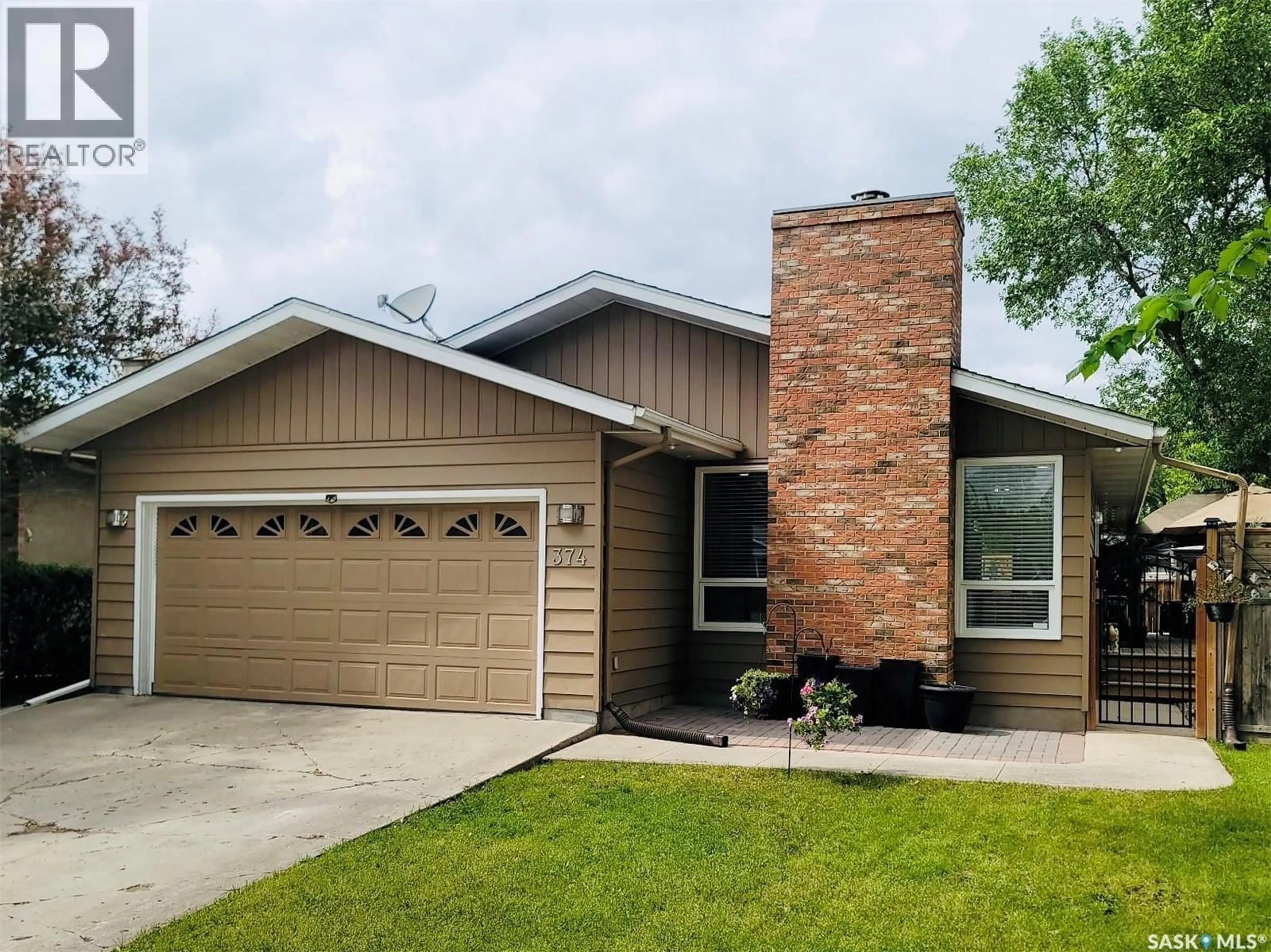 Home with vinyl exterior material, street for 374 RODENBUSH DRIVE, Regina Saskatchewan S4R7L5