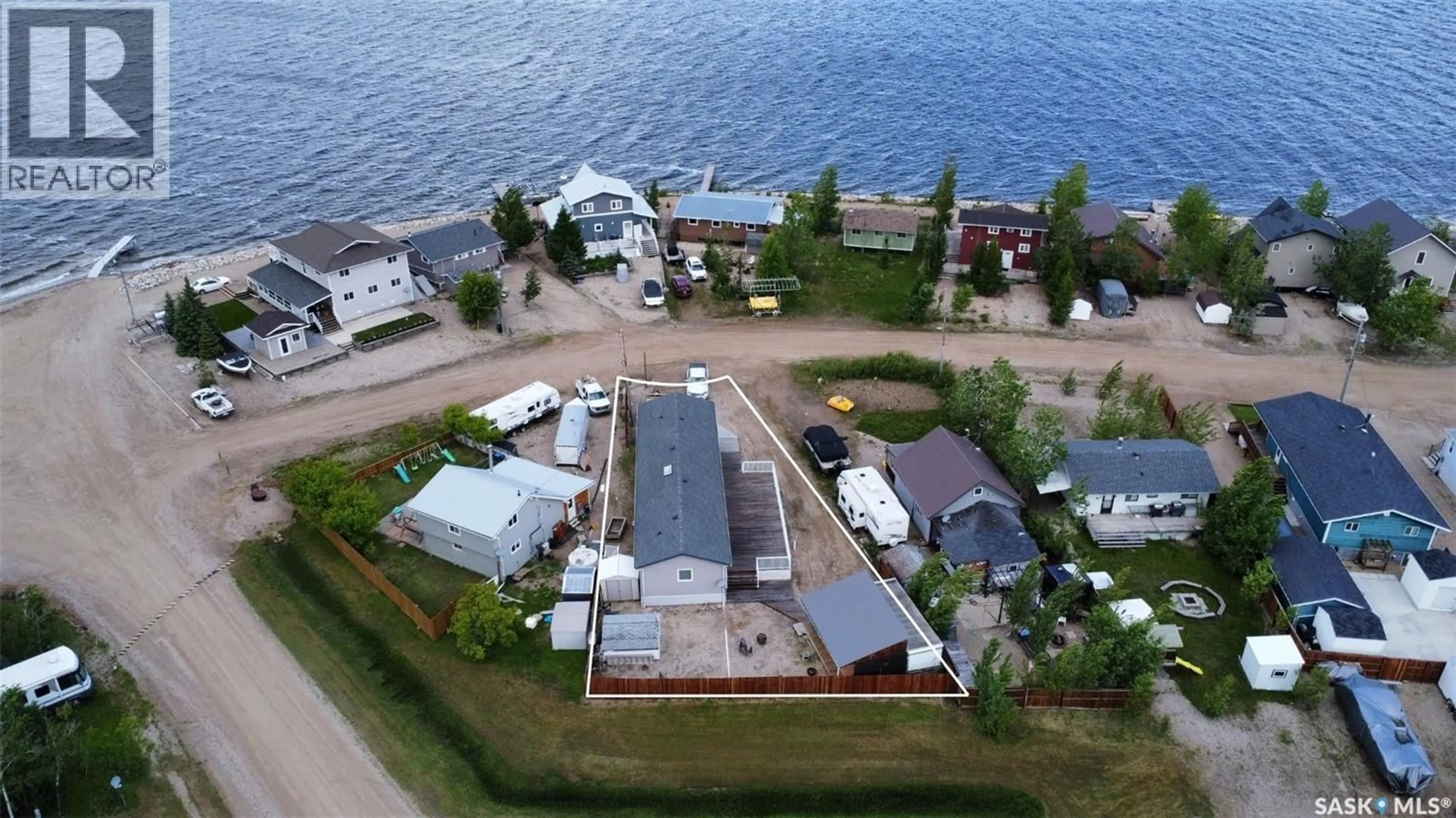 A pic from outside/outdoor area/front of a property/back of a property/a pic from drone, water/lake/river/ocean view for 11 ISABELLA PLACE, Fishing Lake Saskatchewan S0A1A0