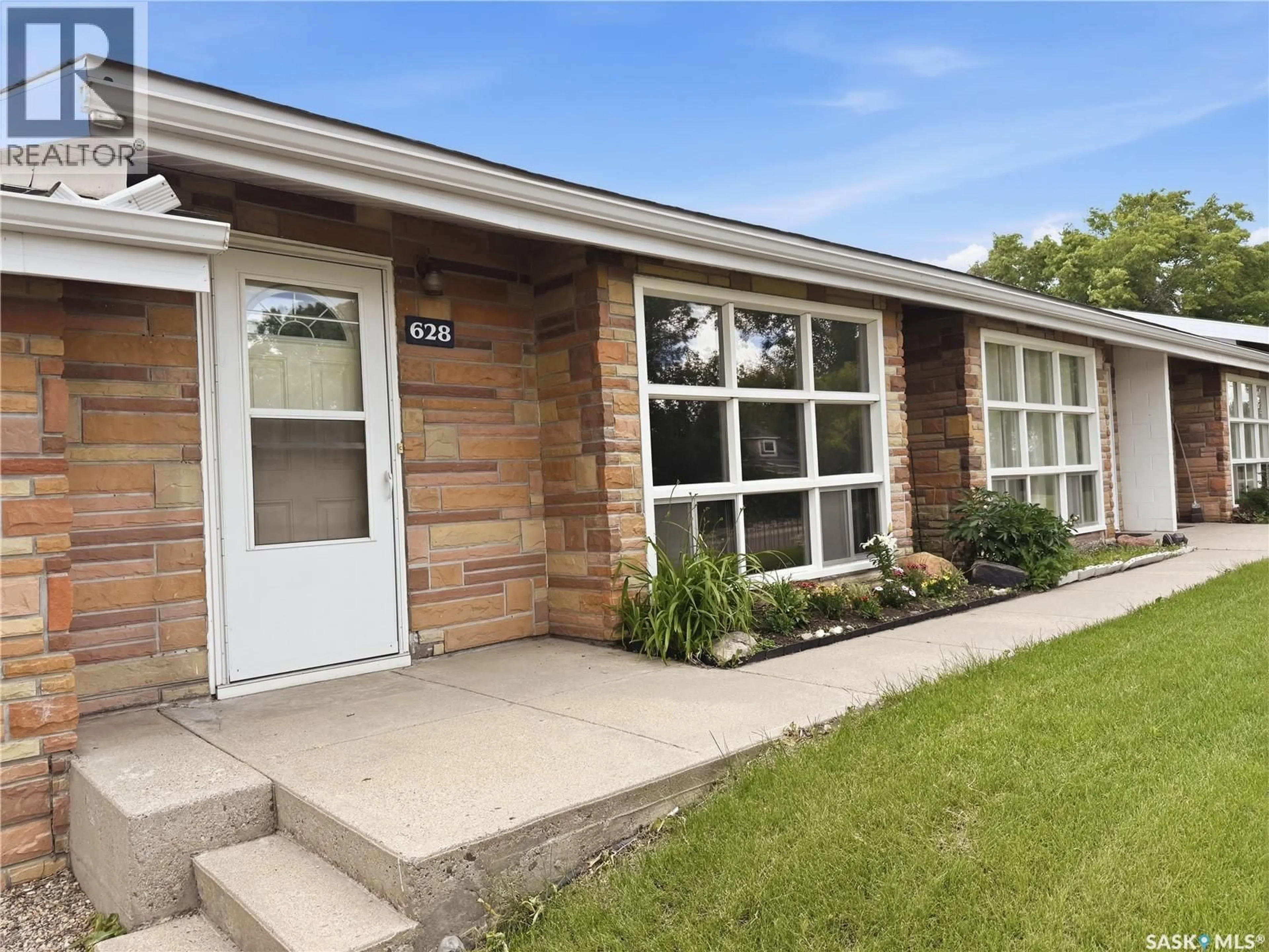 Home with brick exterior material, street for 18 628 1ST AVENUE, Swift Current Saskatchewan S9H2B9