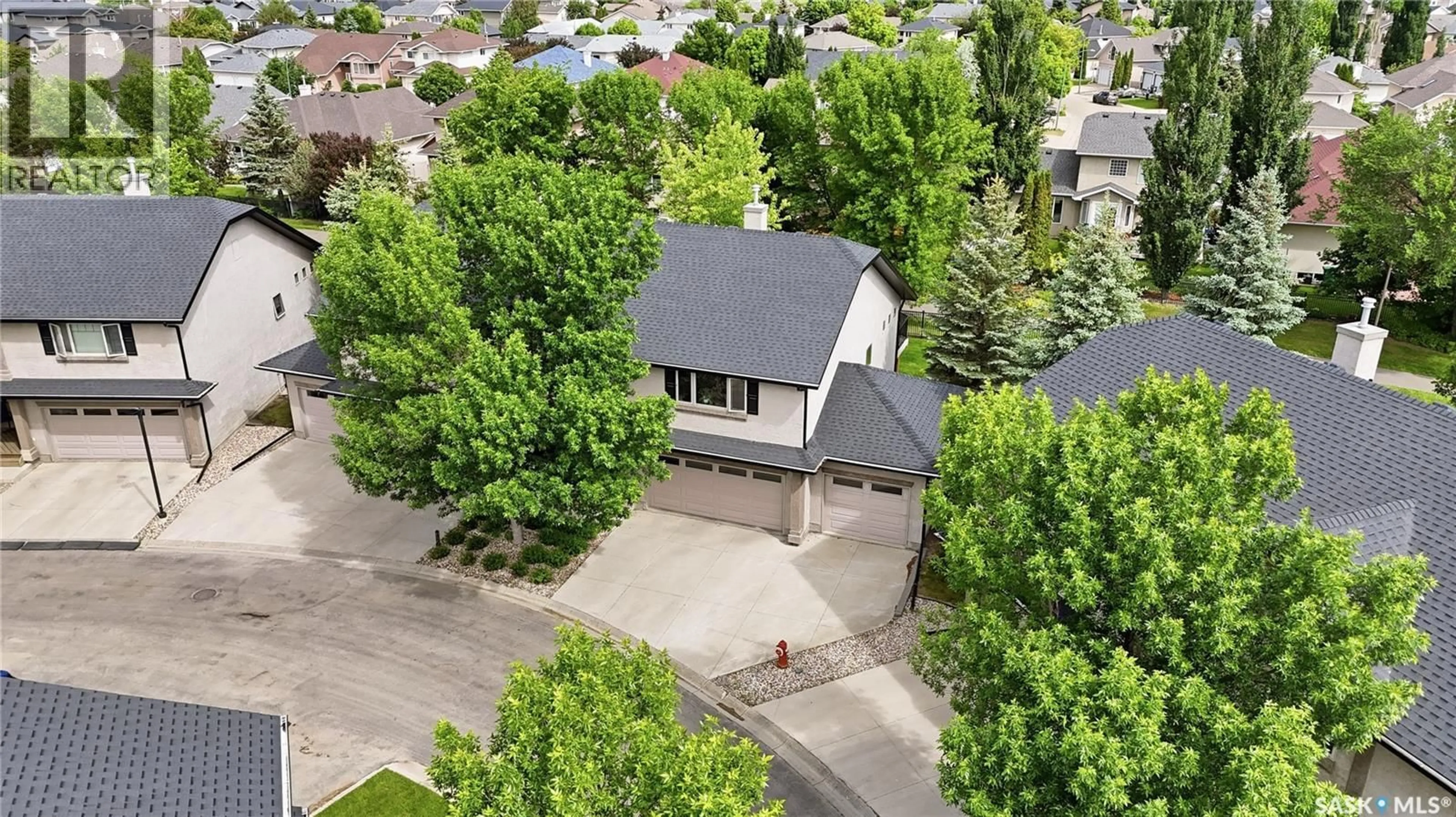 A pic from outside/outdoor area/front of a property/back of a property/a pic from drone, street for 117 - 1110 BRIARWOOD ROAD, Saskatoon Saskatchewan S7N0A1