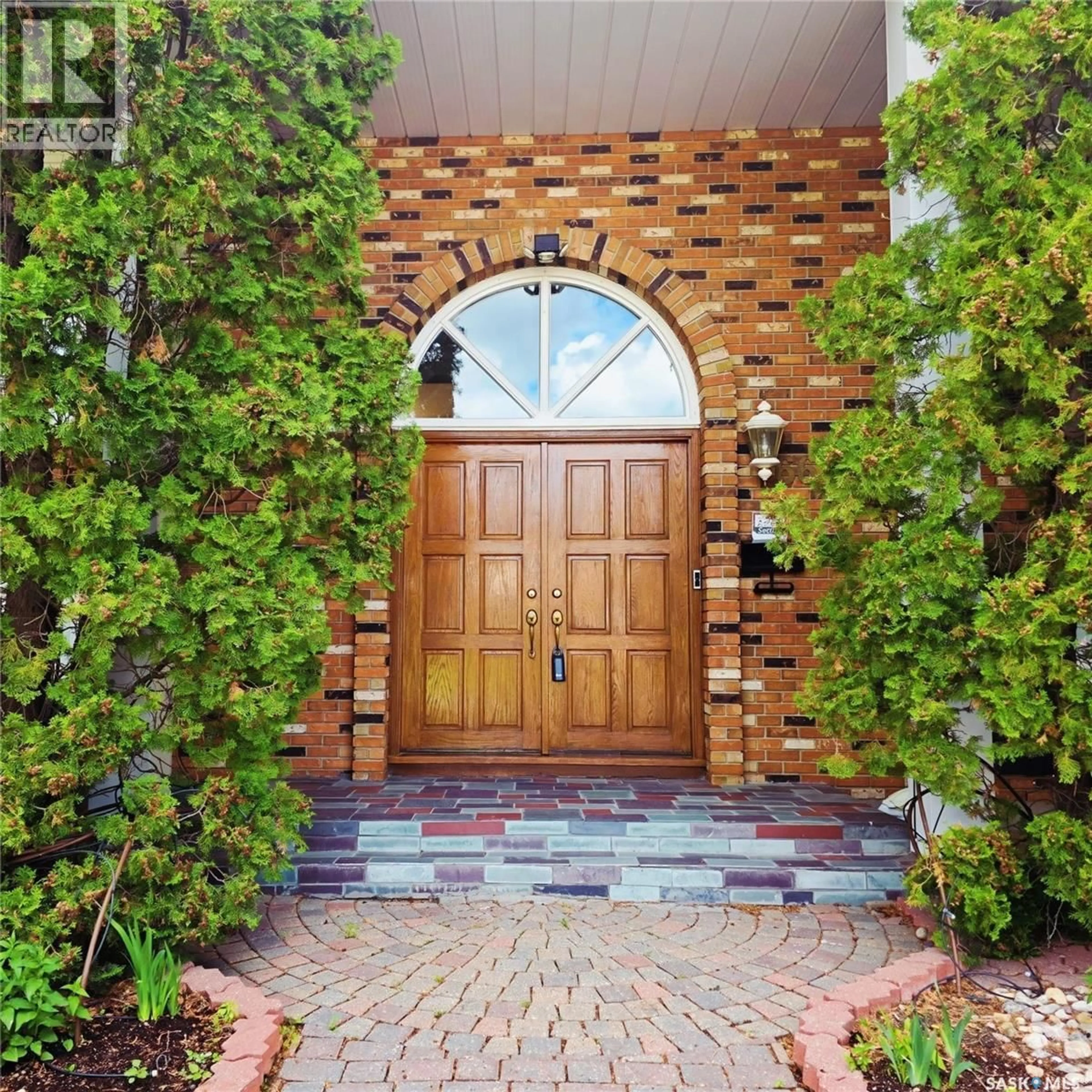 Home with brick exterior material, street for 66 LESLIE PLACE, Regina Saskatchewan S4S6R2