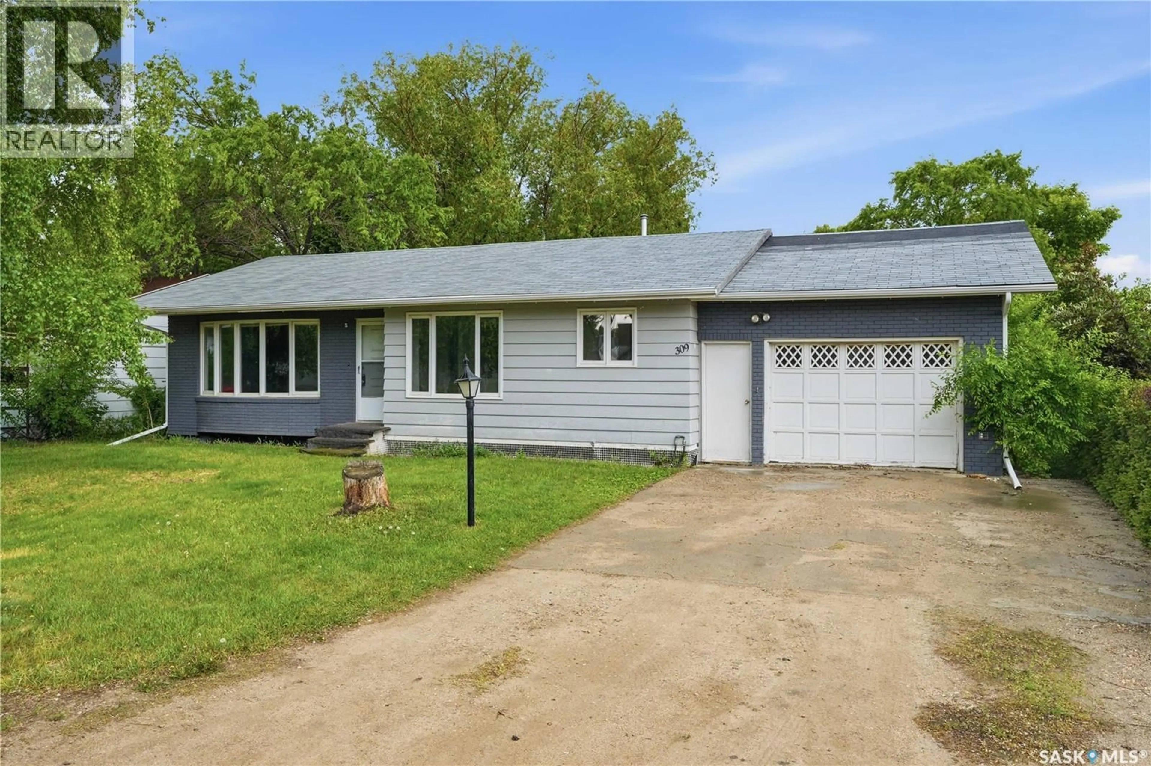 Home with vinyl exterior material, street for 309 SHEPARD STREET, Borden Saskatchewan S0K0N0