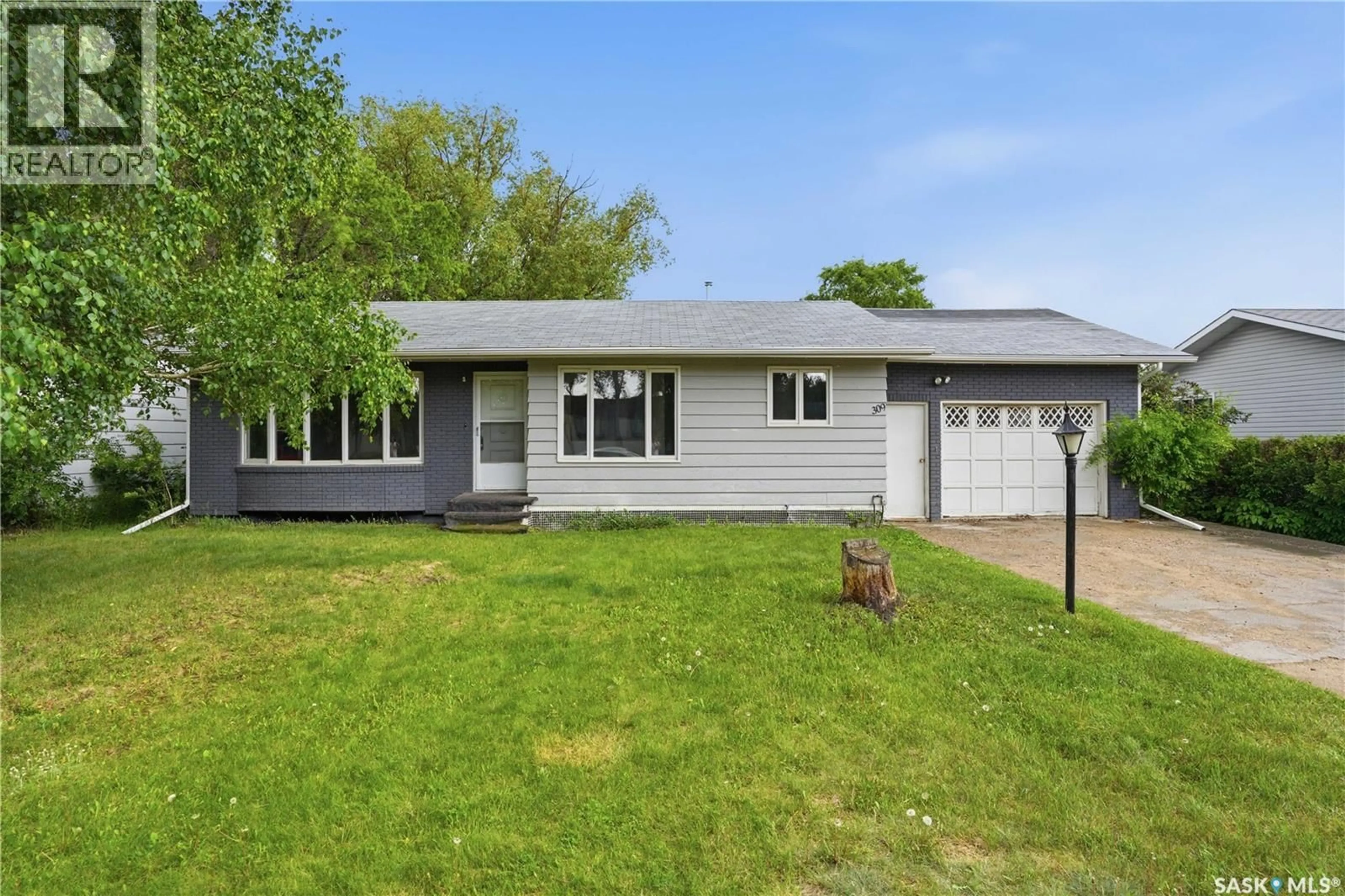 Home with vinyl exterior material, street for 309 SHEPARD STREET, Borden Saskatchewan S0K0N0