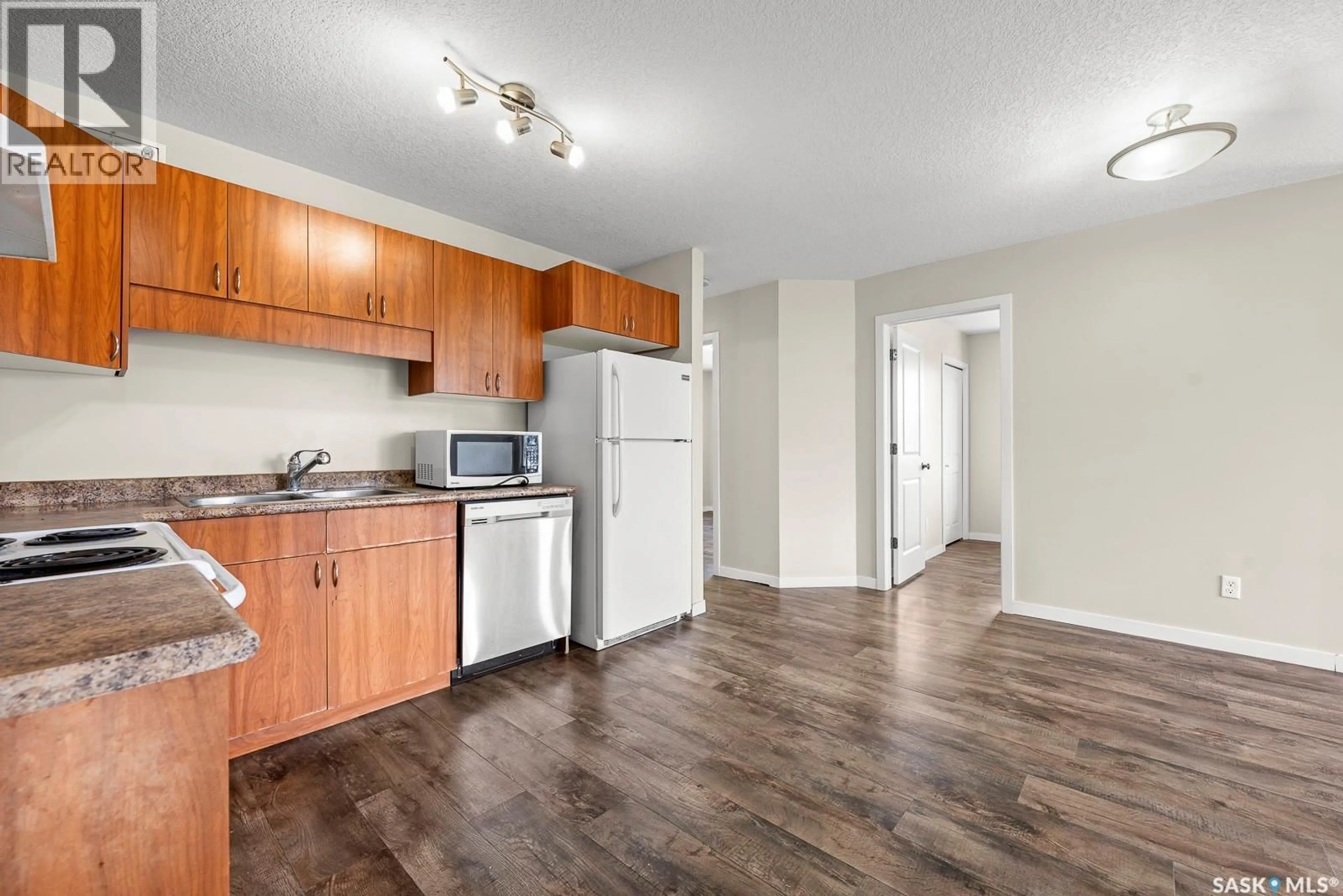 Standard kitchen, wood/laminate floor for 101 - 5051 JAMES HILL ROAD, Regina Saskatchewan S4W0B9