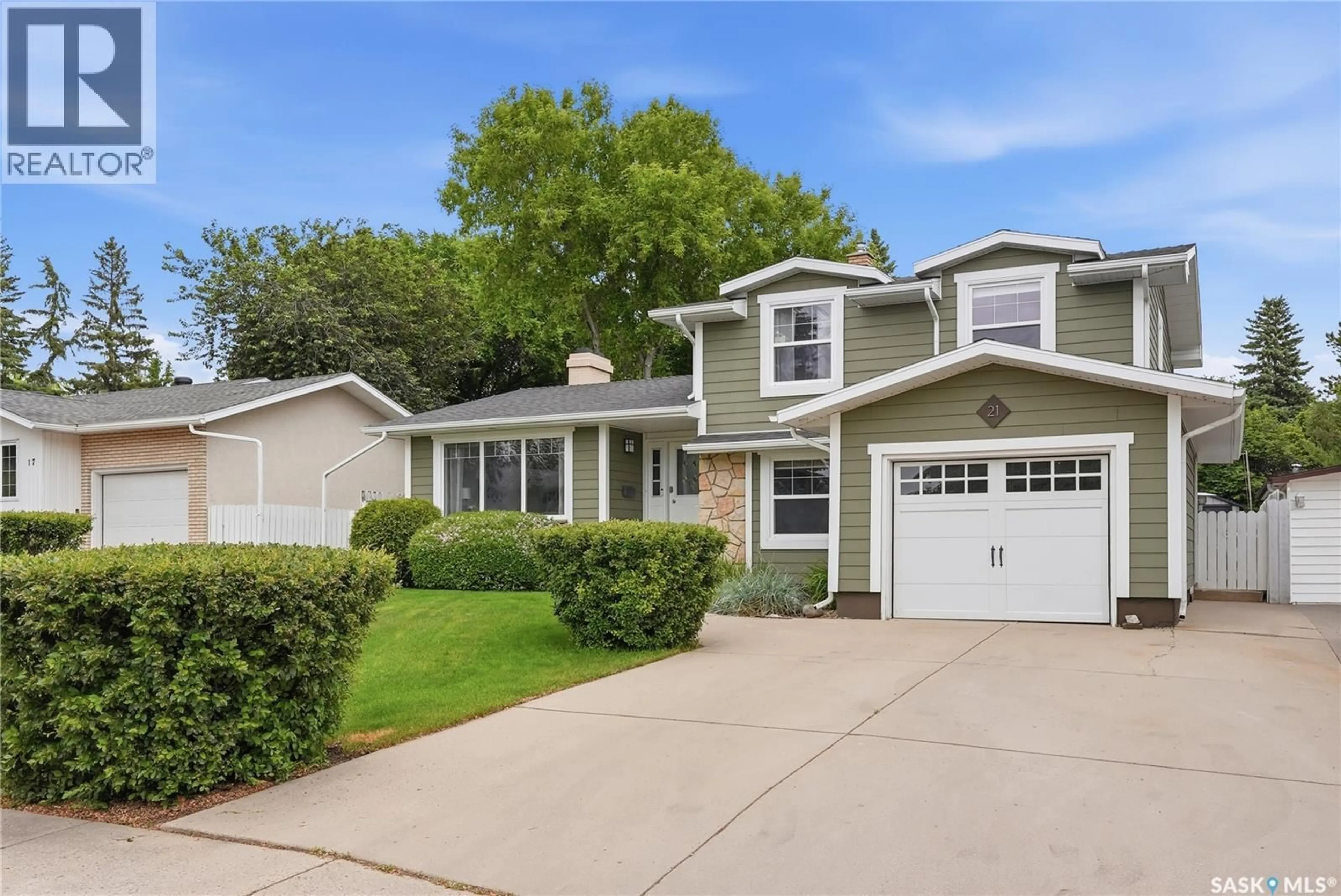 Home with vinyl exterior material, street for 21 NEILSON CRESCENT, Saskatoon Saskatchewan S7H3N4