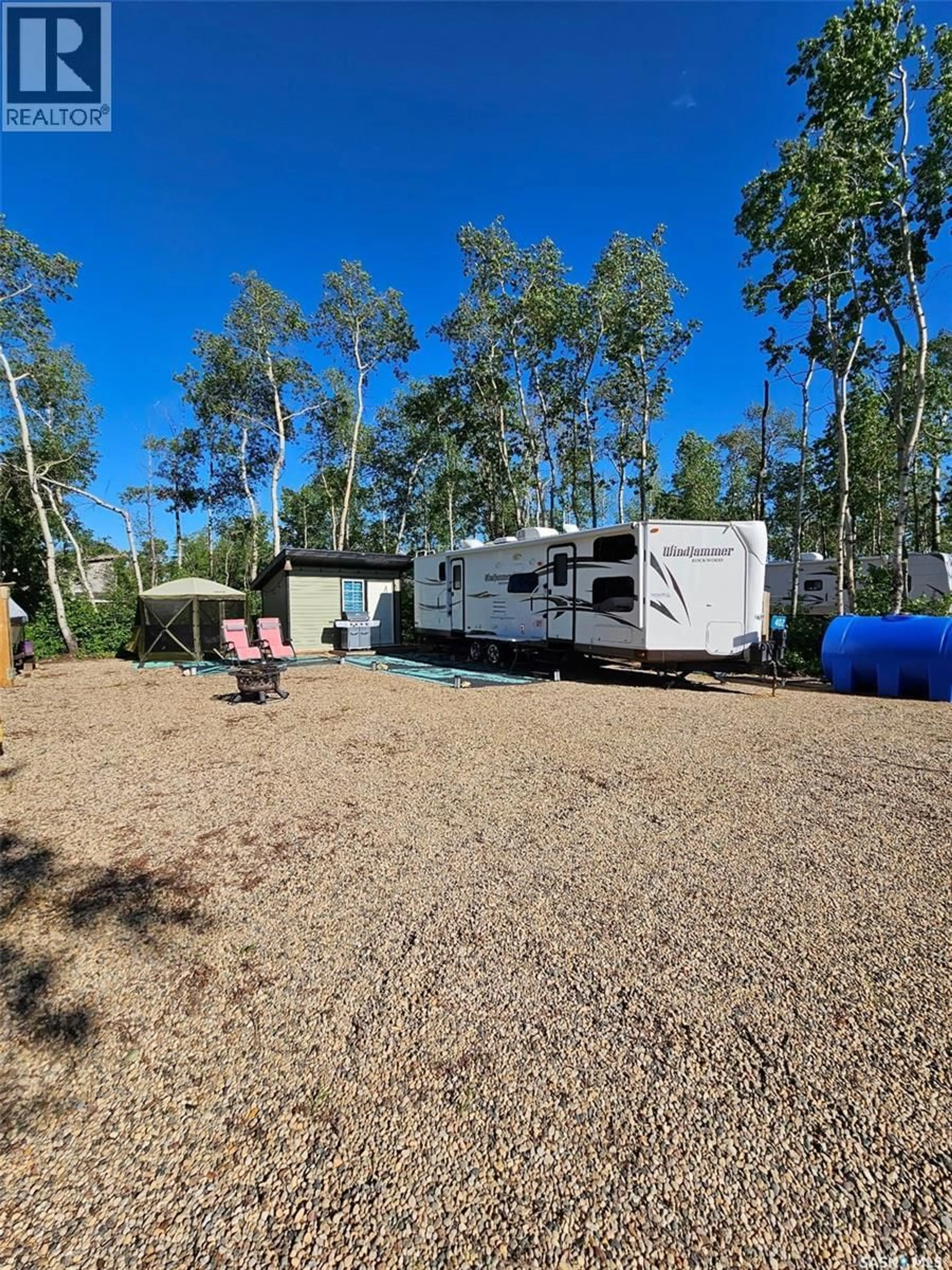 A pic from outside/outdoor area/front of a property/back of a property/a pic from drone, unknown for 402 ASPEN STREET, Lenore Lake Saskatchewan S0K2J0