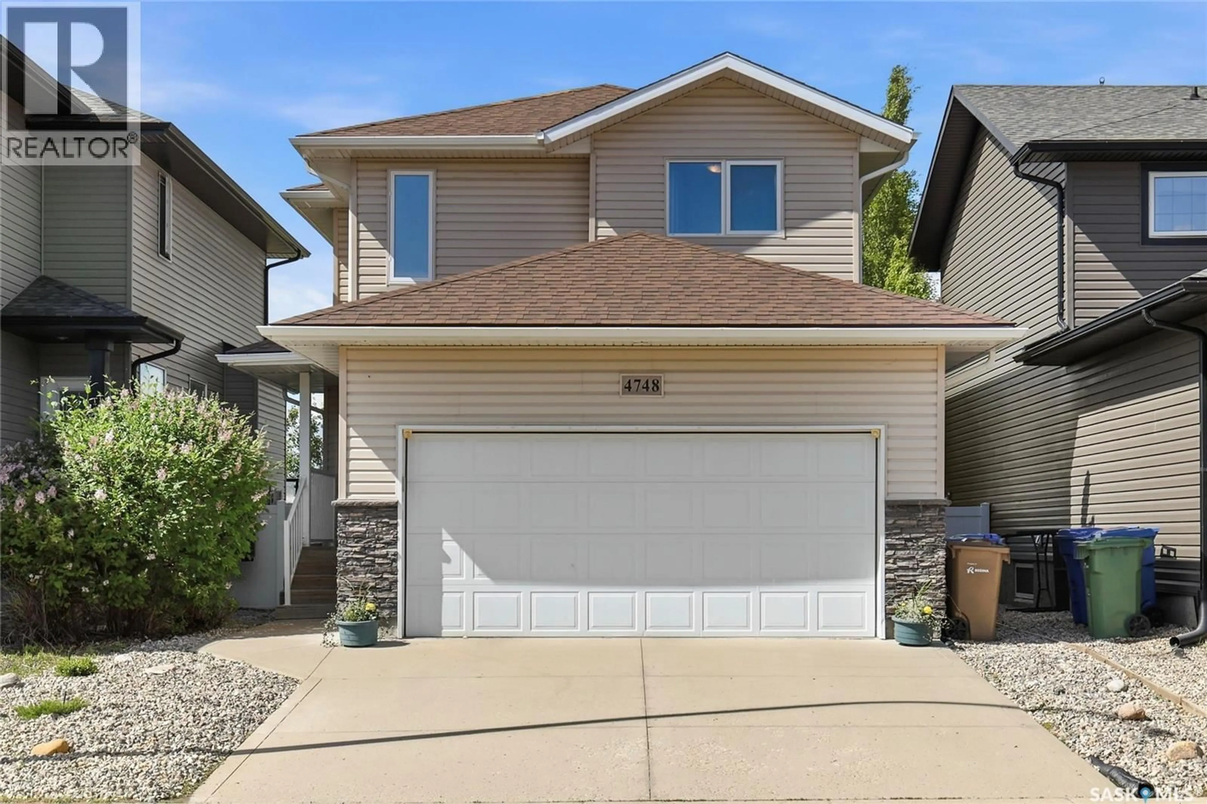 Home with vinyl exterior material, street for 4748 PADWICK AVENUE, Regina Saskatchewan S4W0C4