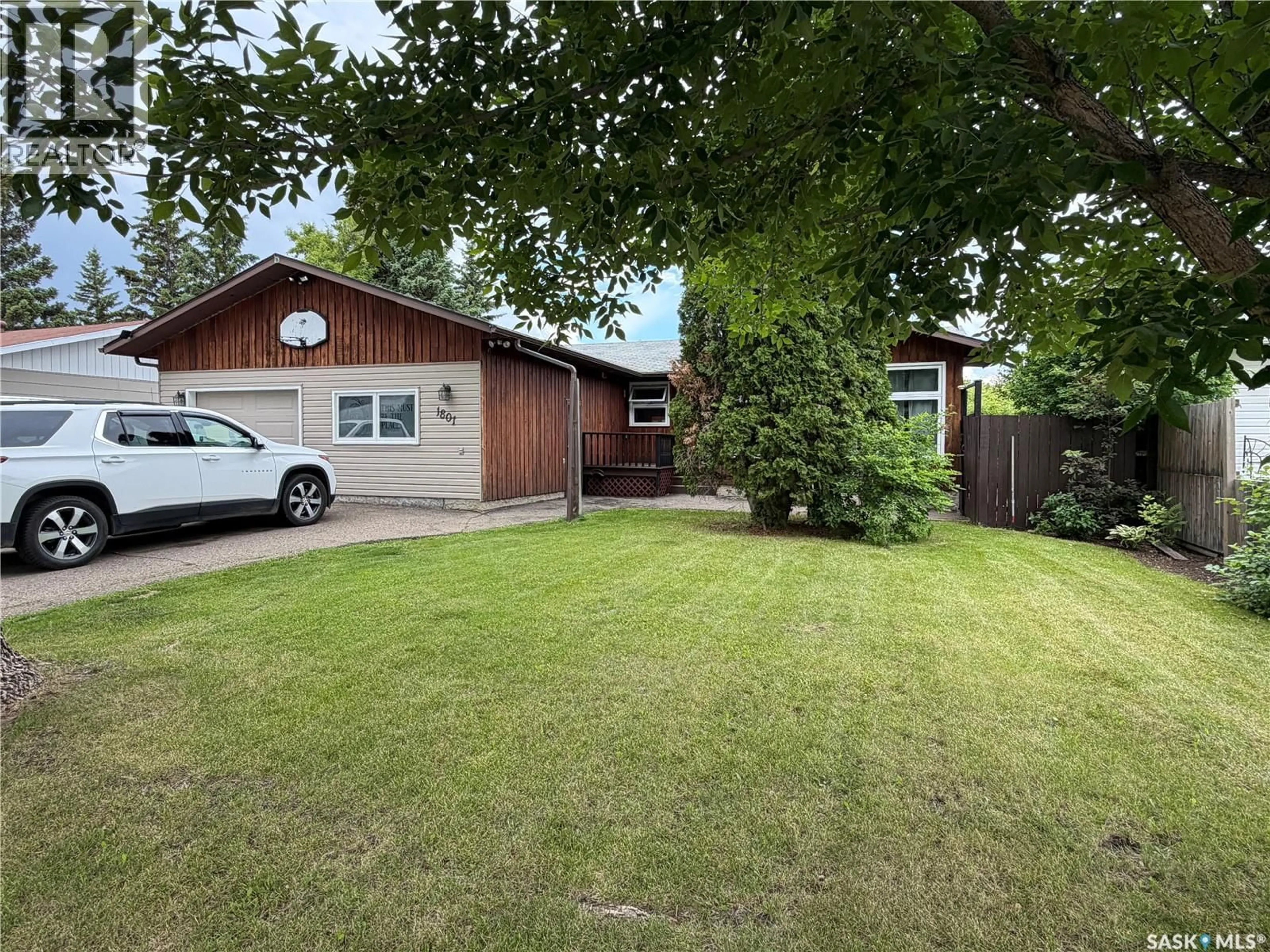 A pic from outside/outdoor area/front of a property/back of a property/a pic from drone, street for 1801 CENTENNIAL CRESCENT, North Battleford Saskatchewan S9A3J2