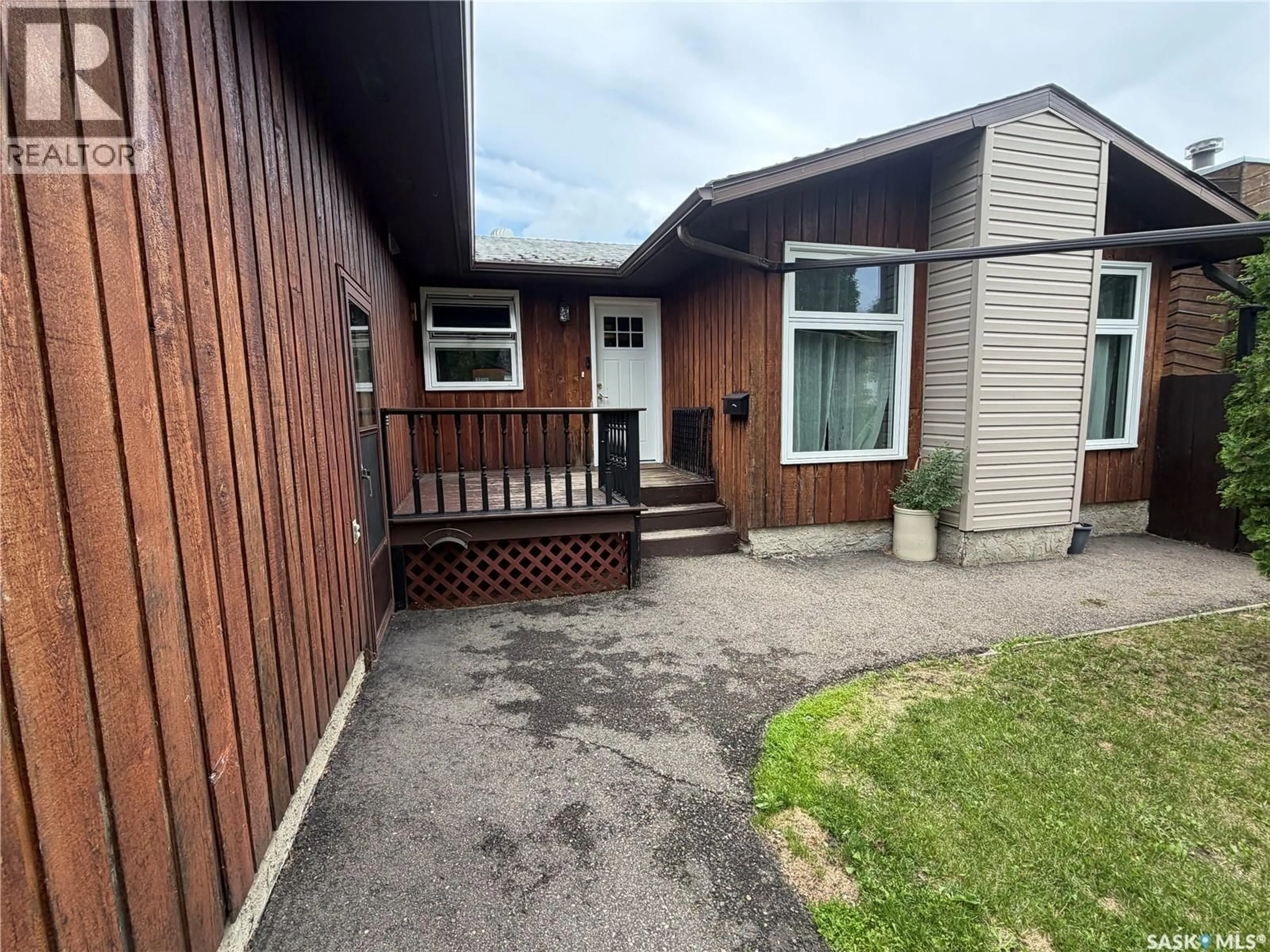 A pic from outside/outdoor area/front of a property/back of a property/a pic from drone, street for 1801 CENTENNIAL CRESCENT, North Battleford Saskatchewan S9A3J2