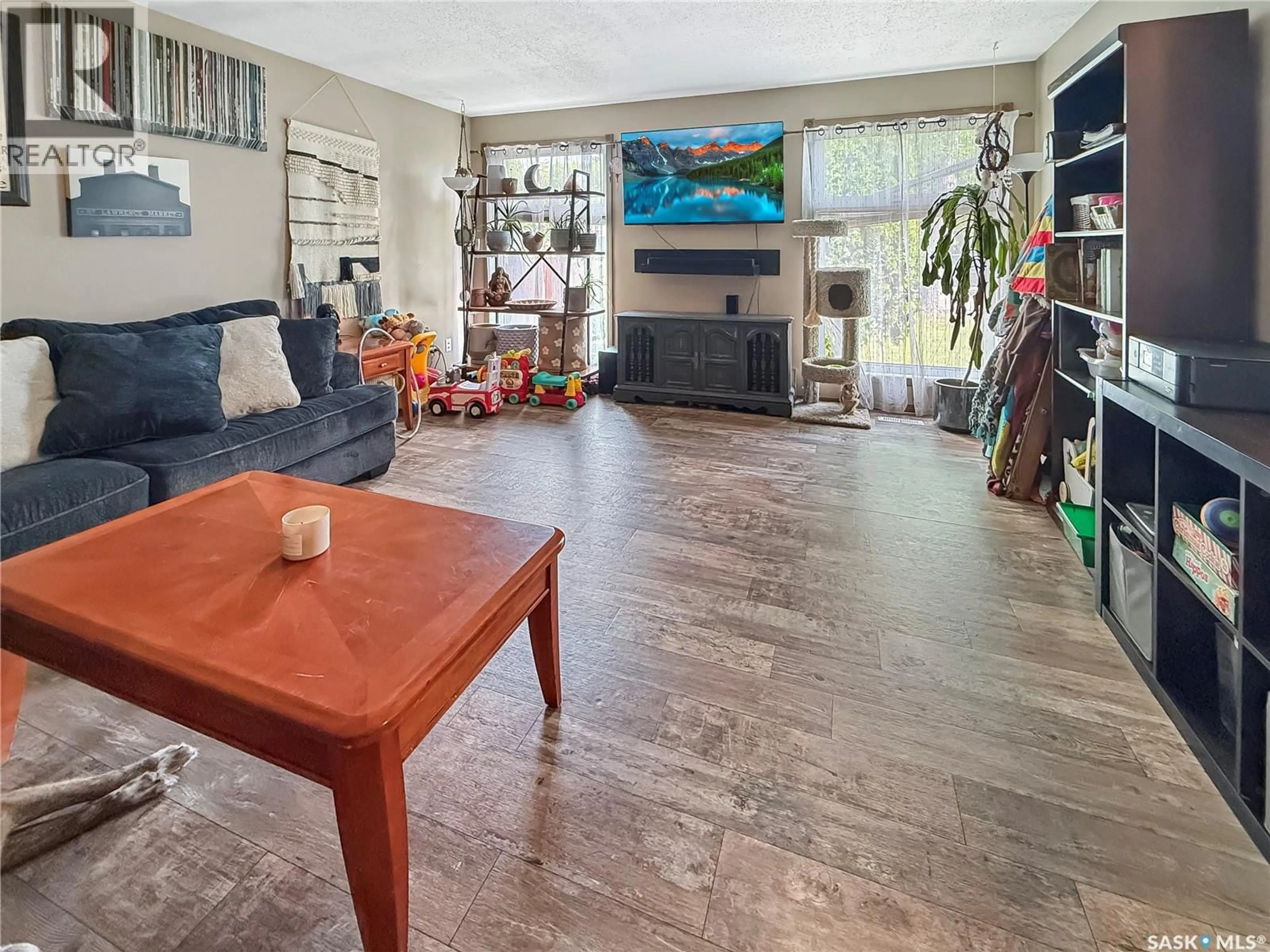 Living room with furniture, unknown for 1801 CENTENNIAL CRESCENT, North Battleford Saskatchewan S9A3J2