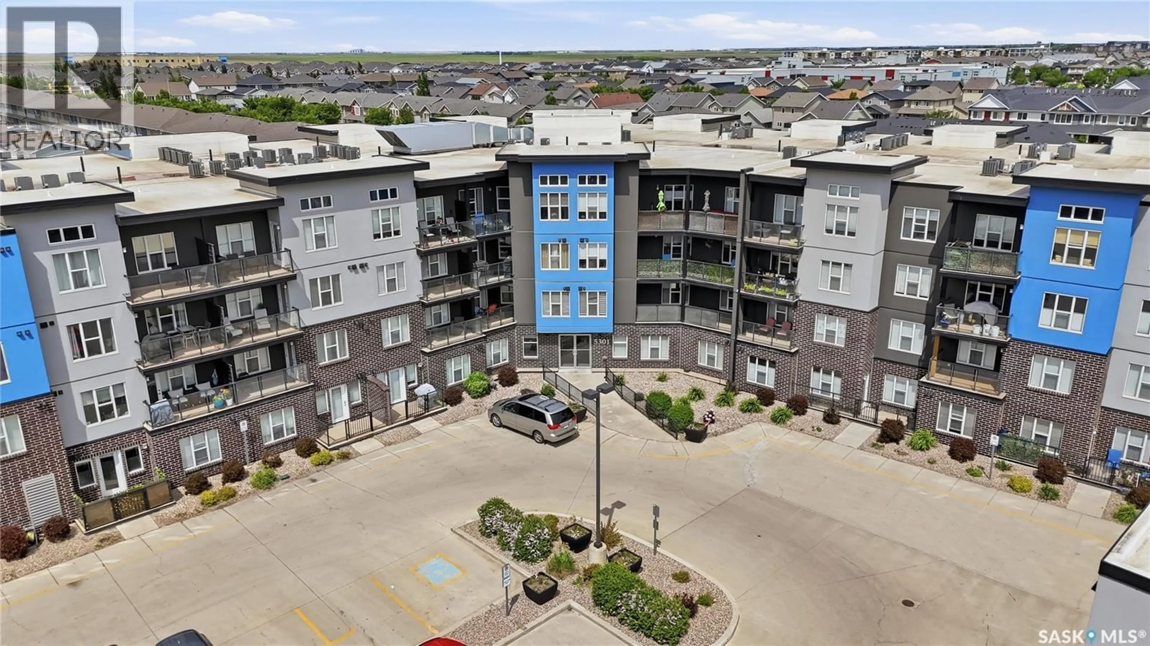 A pic from outside/outdoor area/front of a property/back of a property/a pic from drone, city buildings view from balcony for 323 5301 UNIVERSAL CRESCENT, Regina Saskatchewan S4W0L2